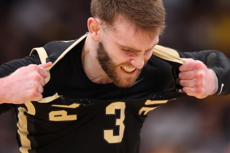 Boilermaker guard Braden Smith shreds his jersey in frustration. He wore #41 to close out the Big Ten Championship.