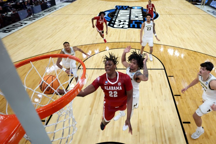 Aiden Sherrell elevates for a dunk