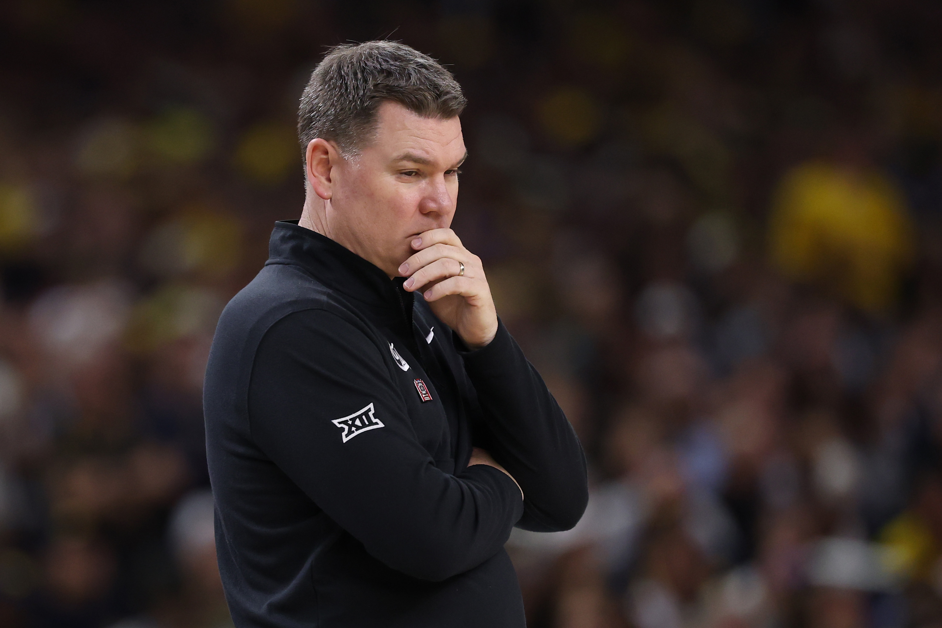 Tommy Lloyd looks glum on the sideline during the 2026 Final Four