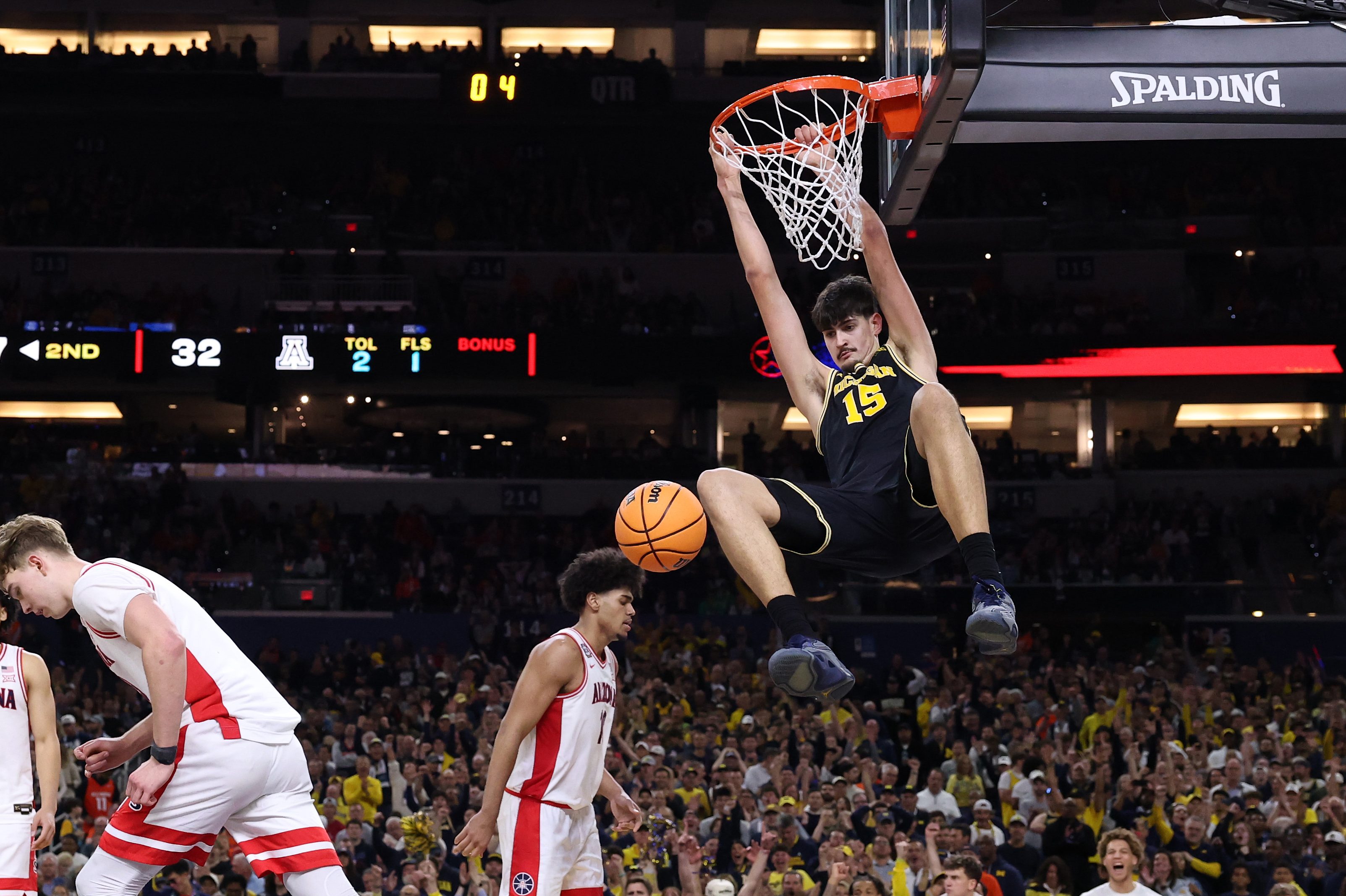 Aday Mara of Michigan dunks the basketball in the 2026 Final Four