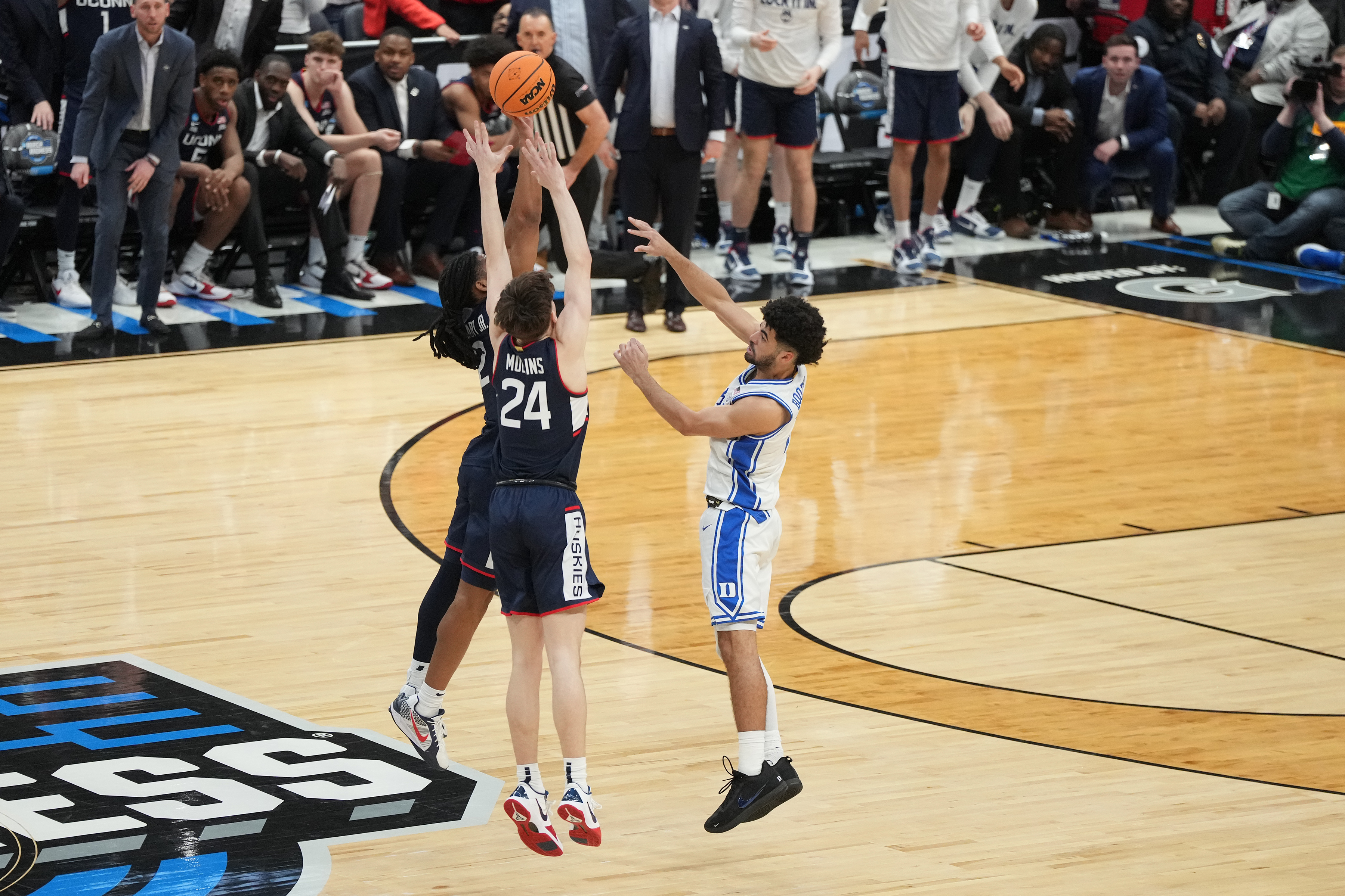 Silas Demary Jr. blocks Cayden Boozer's downcourt pass in the final moments of UConn's Elite Eight win over Duke