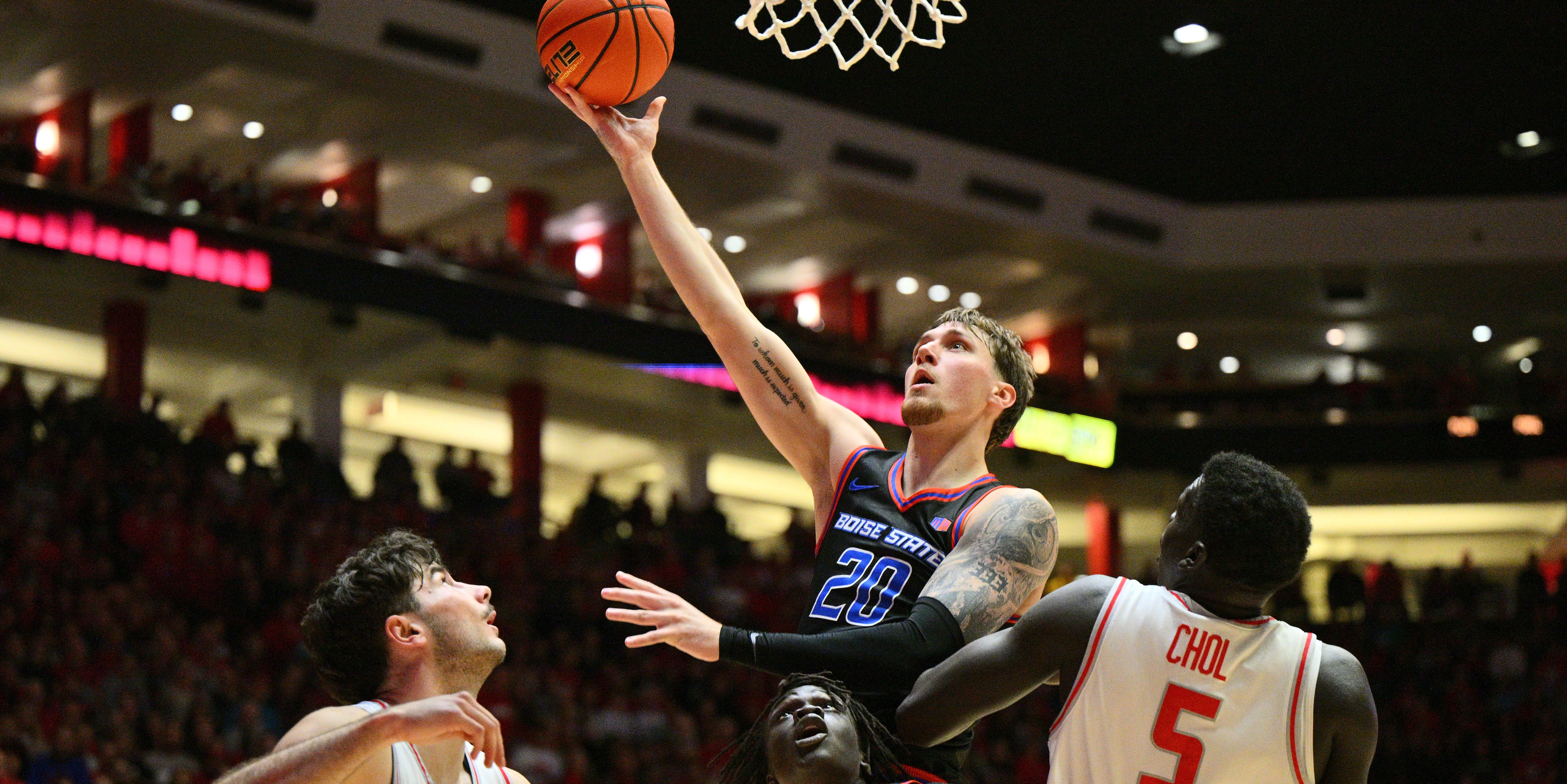 Drew Fielder rises above defenders for a layup