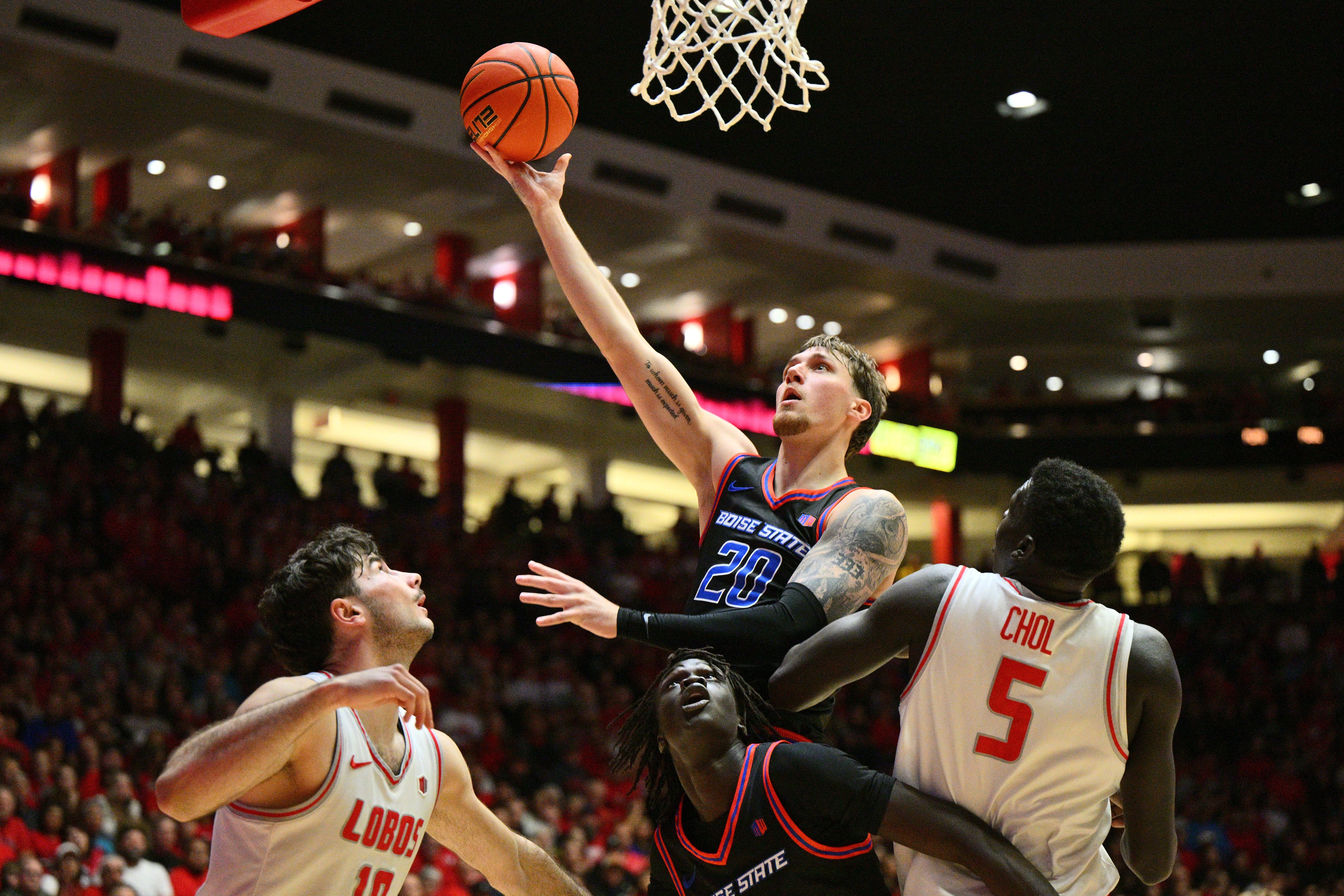 Drew Fielder rises above defenders for a layup