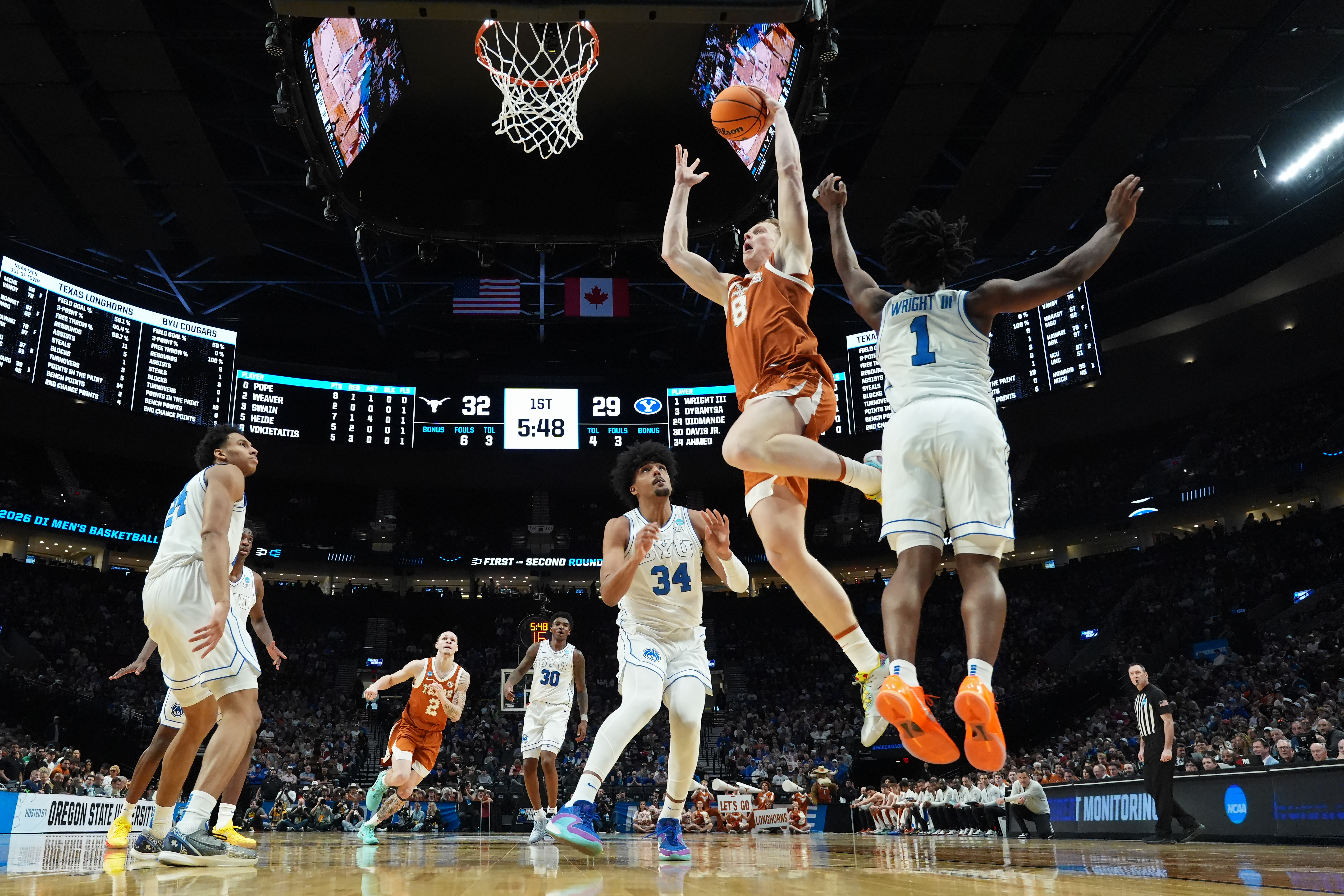 Texas Longhorns big man Matas Vokietaitis goes up for a layup versus BYU