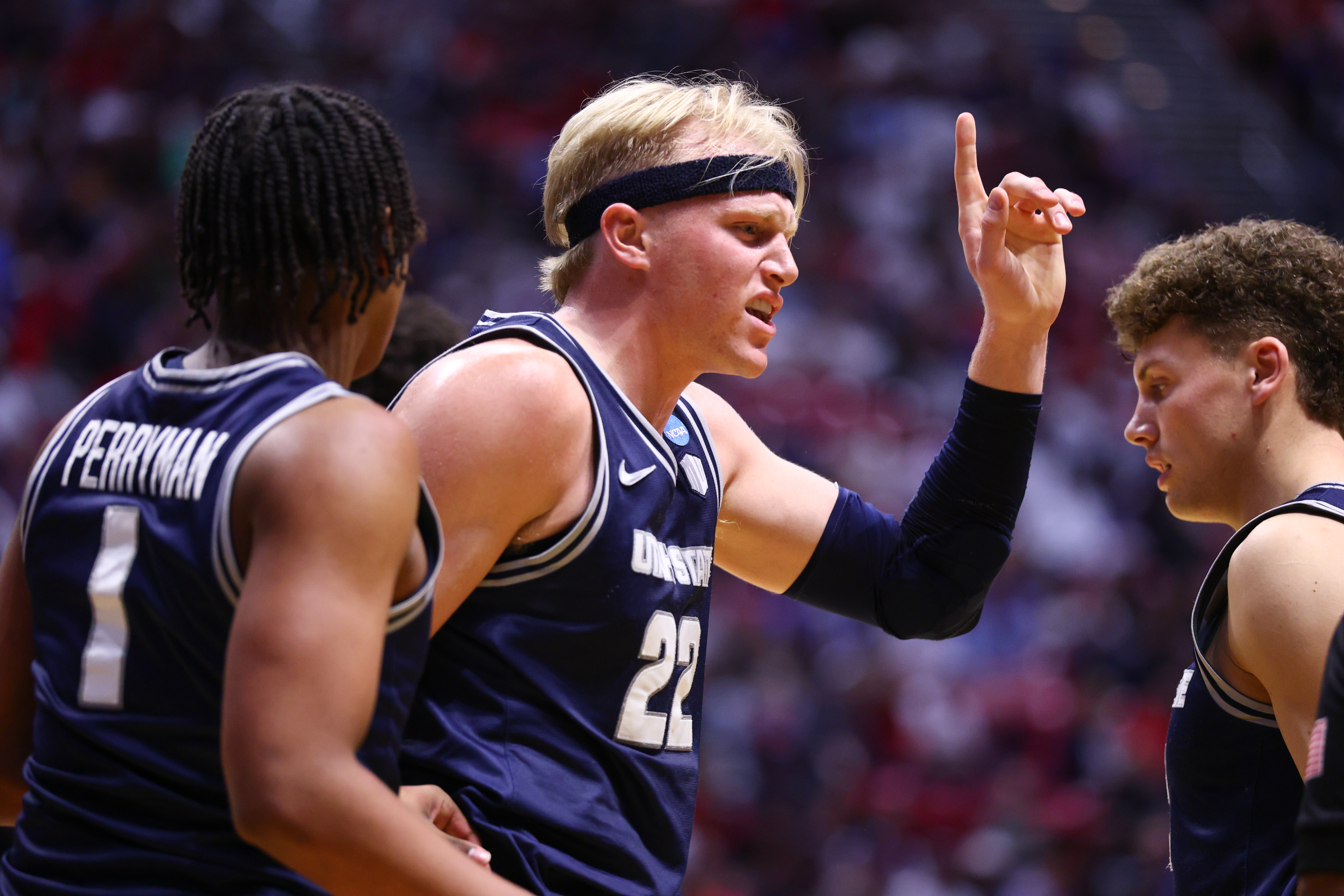 Along with his close friend Falslev, Karson Templin (center) opted to return to the Aggies for his senior season
