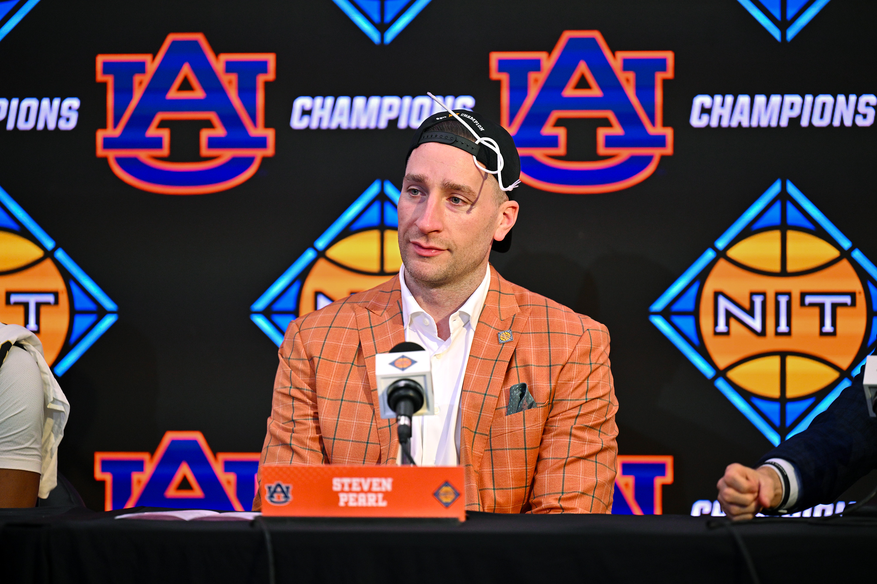 Auburn coach Steve Pearl speaking with the media following his team's victory over Tulsa in the NIT championship game
