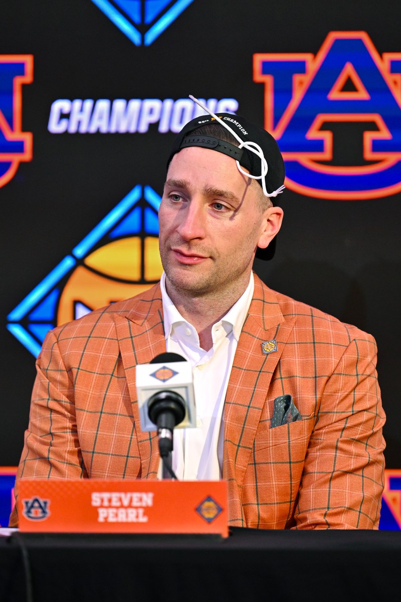 Auburn coach Steve Pearl speaking with the media following his team's victory over Tulsa in the NIT championship game