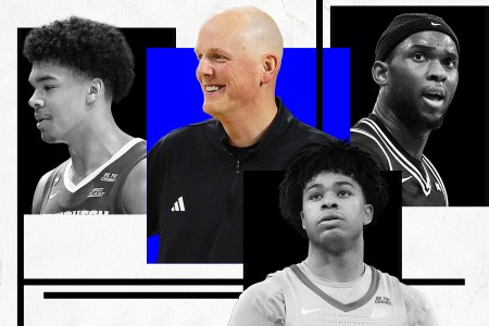 Creighton head coach Alan Huss with (from left to right) Jasen Green, Austin Swartz and Oswin Erhunmwunse