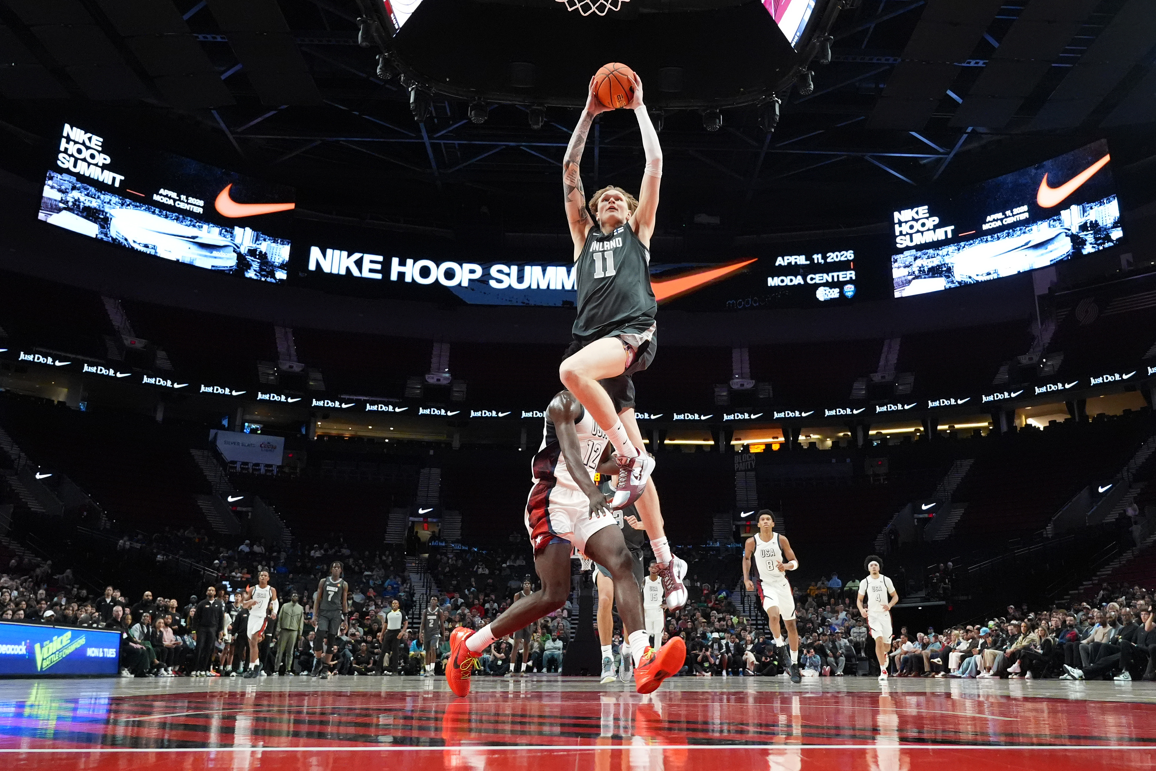 Miikka Muurinen attempts a dunk for Team World at the 2026 Nike Hoop Summit