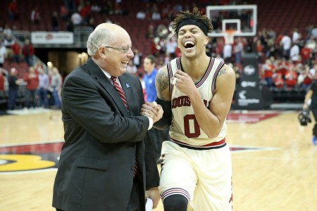 Kenny Klein celebrates with Louisville great Damion Lee after a win vs. Duke