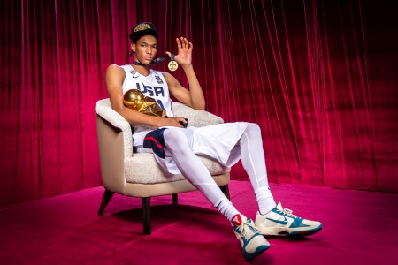 CJ Rosser poses with his medal and trophy after winning the FIBA U17 World Cup