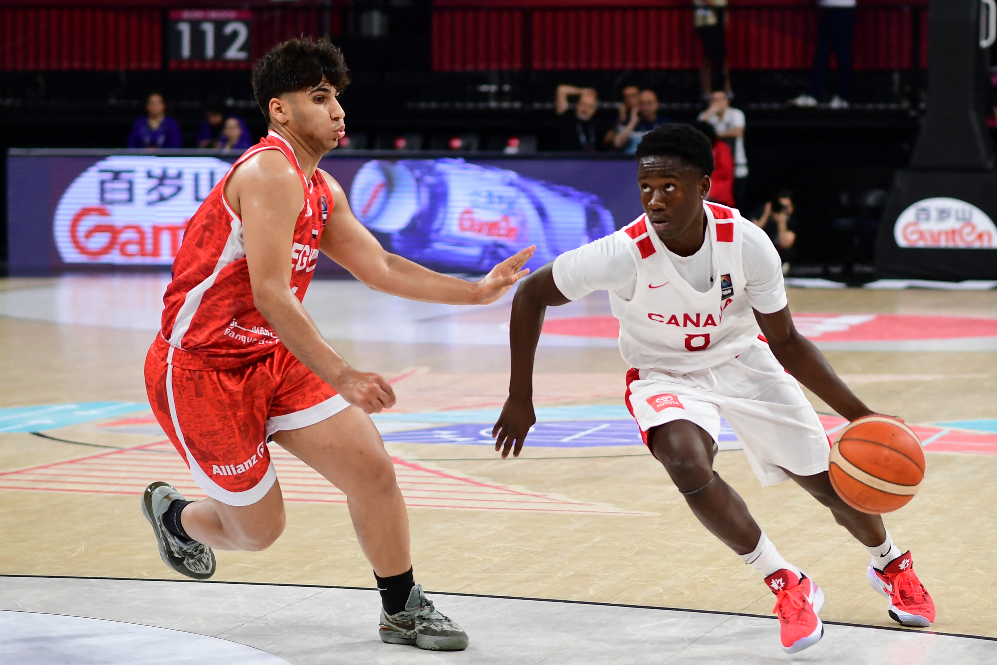 Incoming West Virginia freshman Miles Sadler dribbling the ball for Team Canada at the 2024 FIBA U17 World Cup
