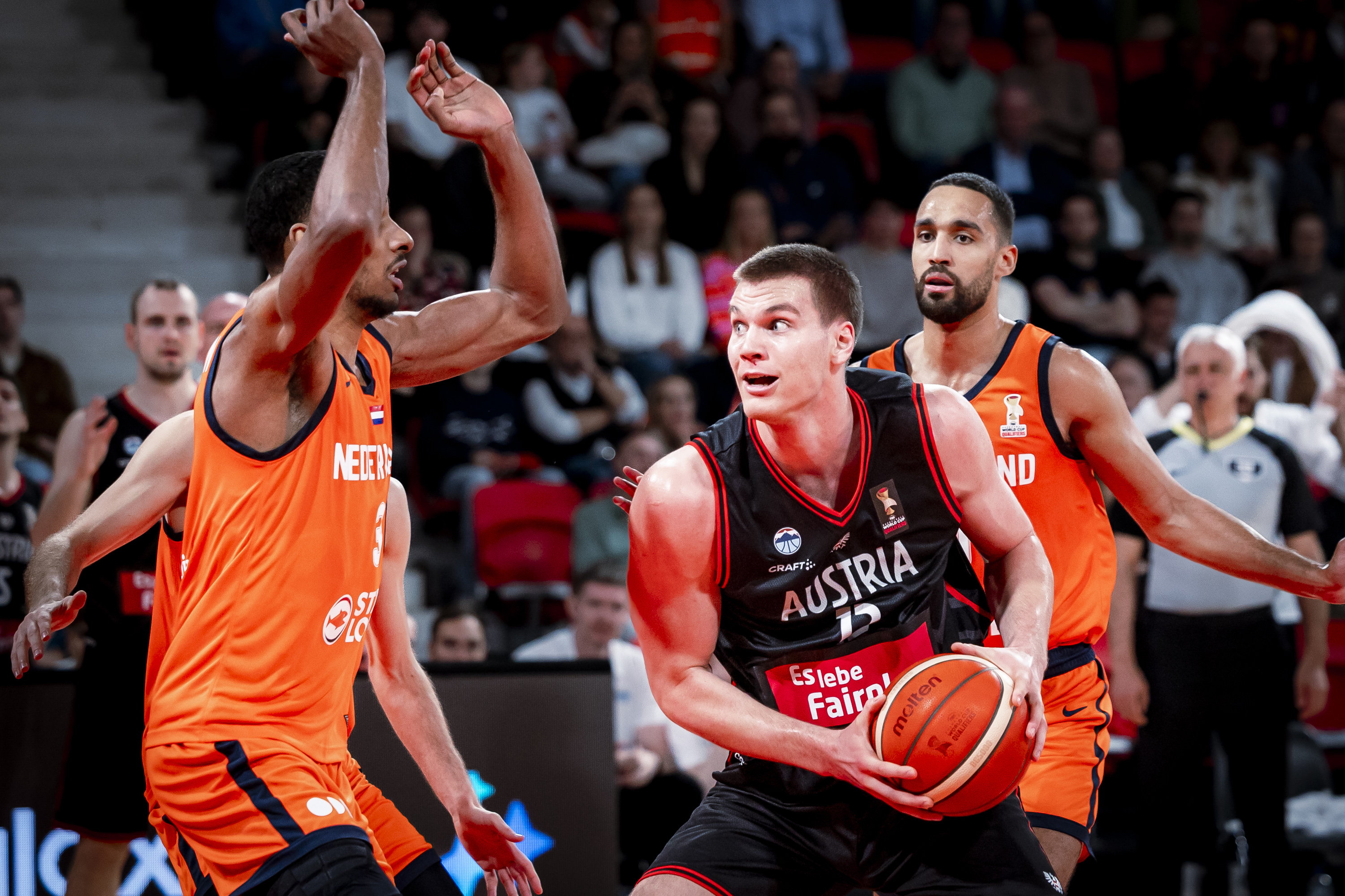 Fynn Schott, seen here with the ball for Team Austria at a FIBA tournament, will give Utah an efficient post presence