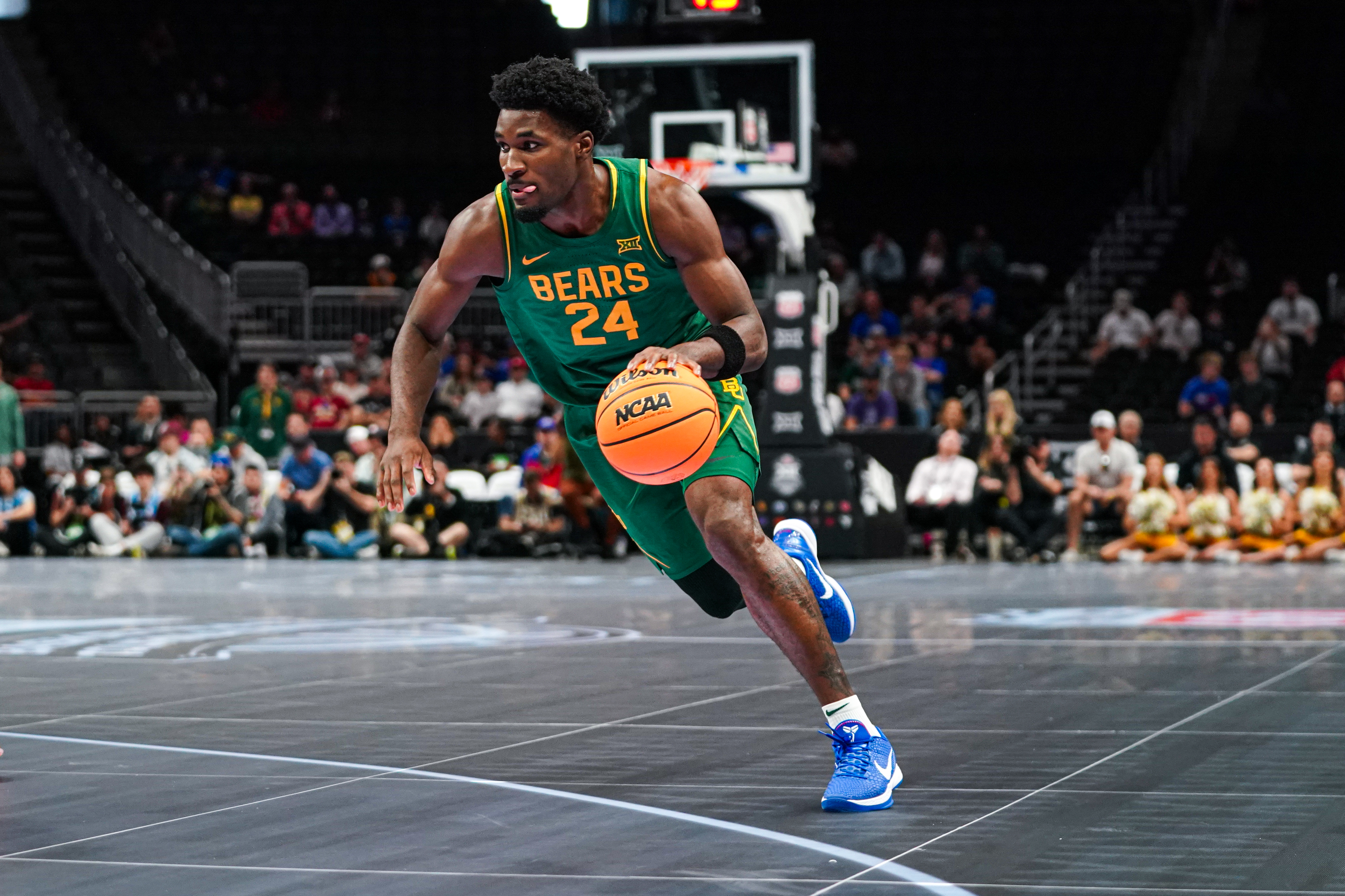 Baylor's Tounde Yessoufou driving to the hoop in a 2026 Big 12 Tournament game against Arizona State