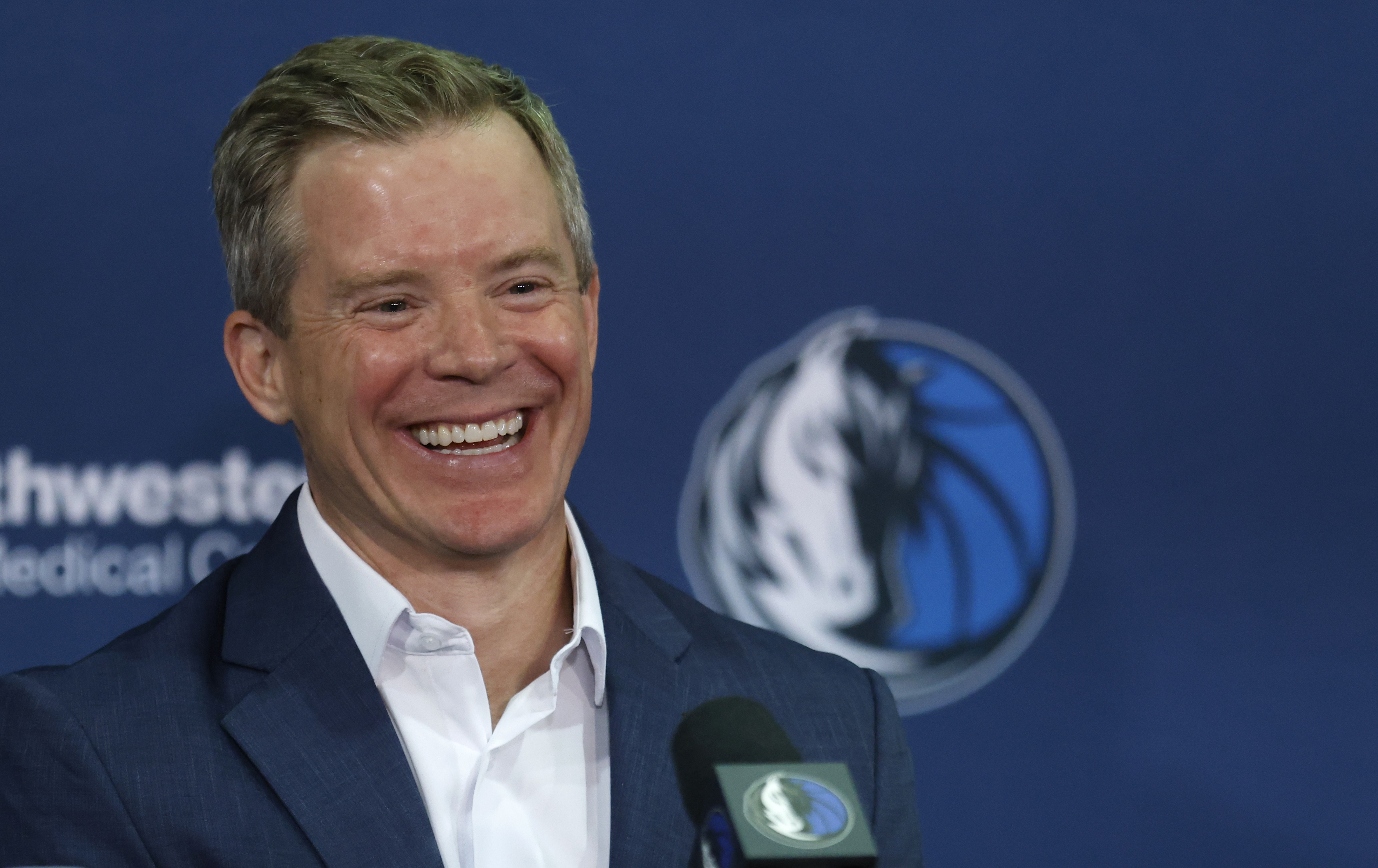 Dusty May at his introductory press conference with the Mavericks