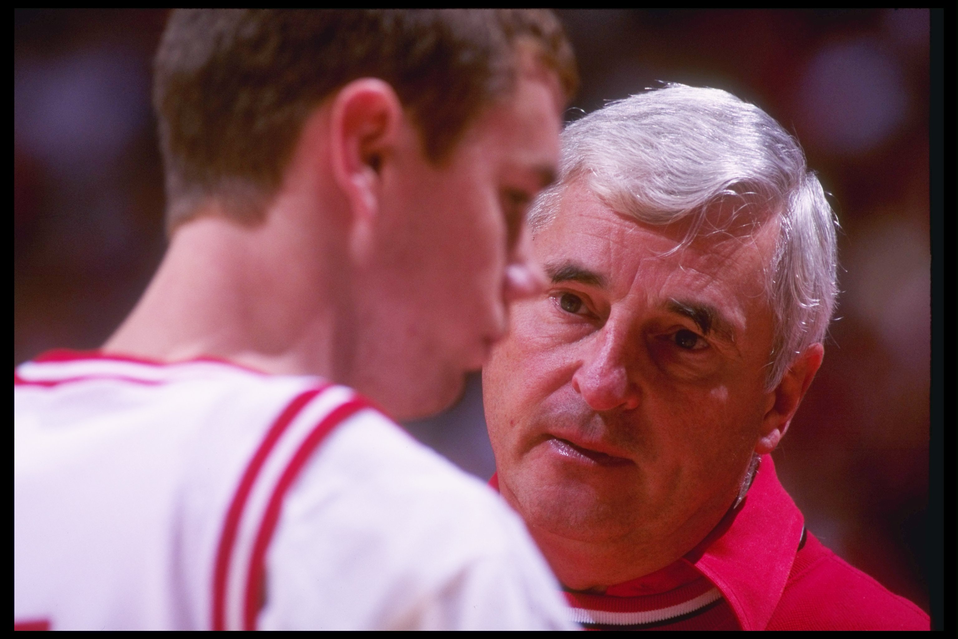 Bob Knight looks over freshman guard Neil Reed in 1995