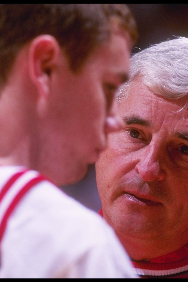 Bob Knight looks over freshman guard Neil Reed in 1995