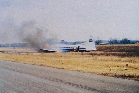 Picture of a chartered airplane carrying members of the East Tennessee State basketball team after it crash-landed at Walker County Airport in 1984