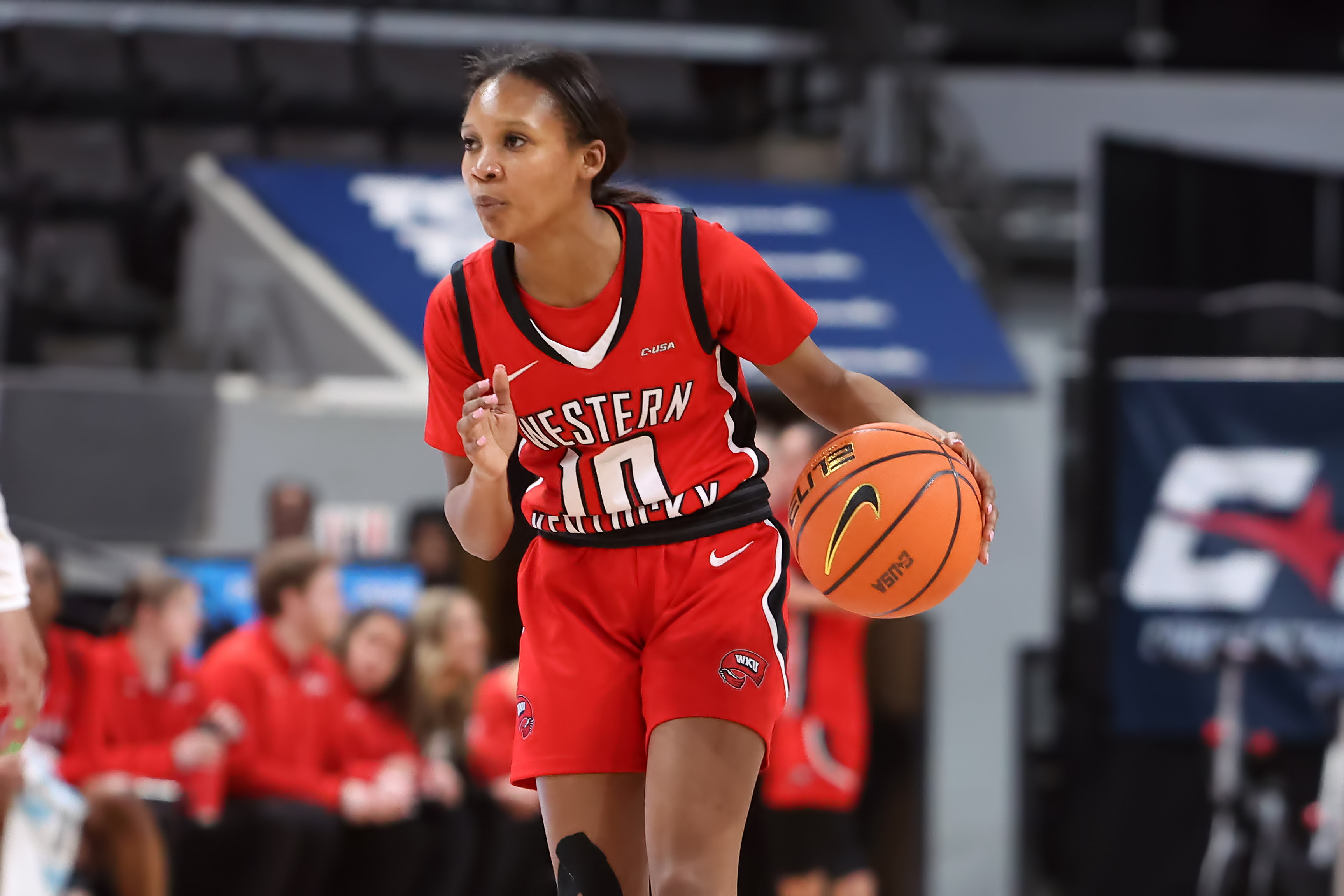 Point guard Acacia Hayes brings the ball up court for Western Kentucky