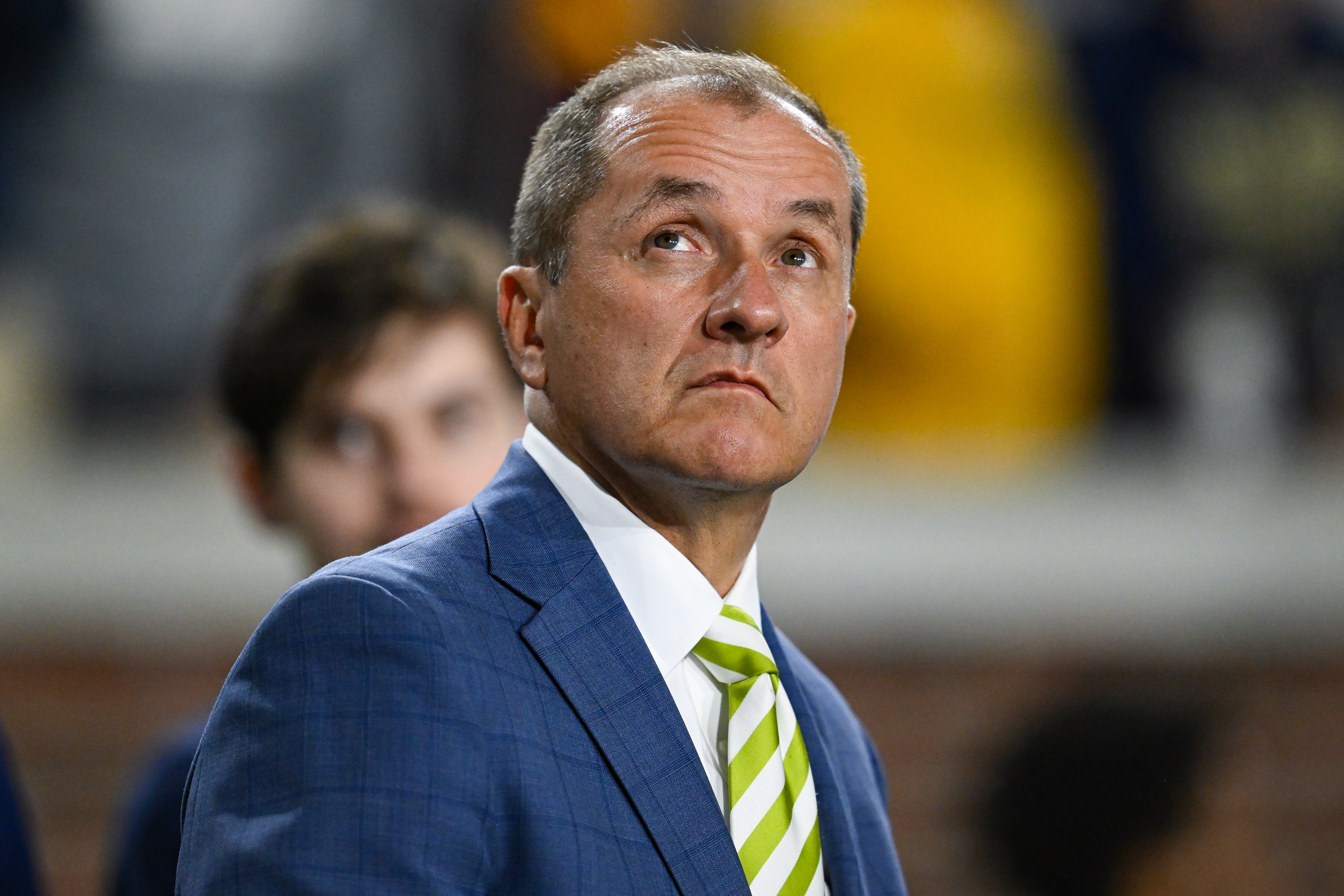 ACC Commissioner Jim Phillips on the sidelines during a 2025 college football game between Pitt and Georgia Tech
