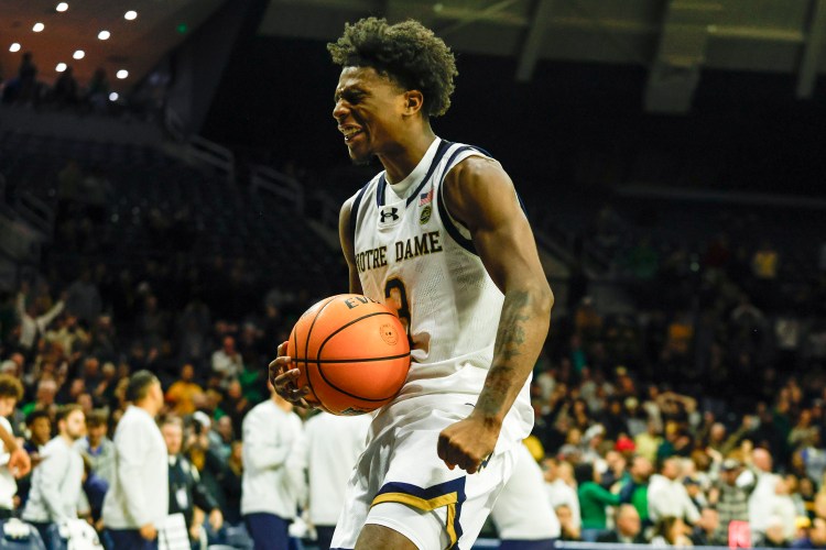 Notre Dame guard Markus Burton reacts positively to a big play in a 2025 game against Missouri