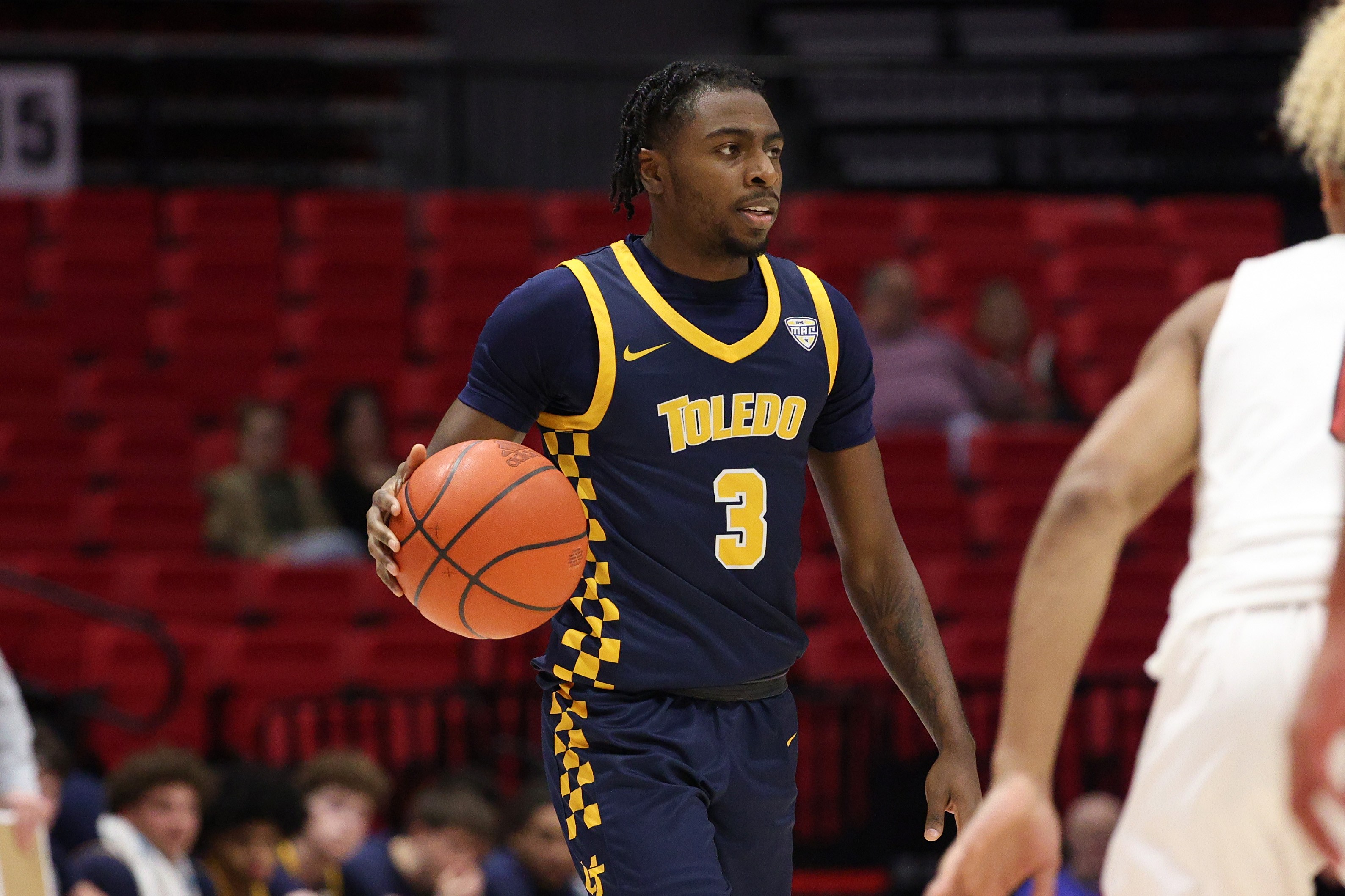 Toledo's Sonny Wilson dribbles the ball up court against Northern Illinois