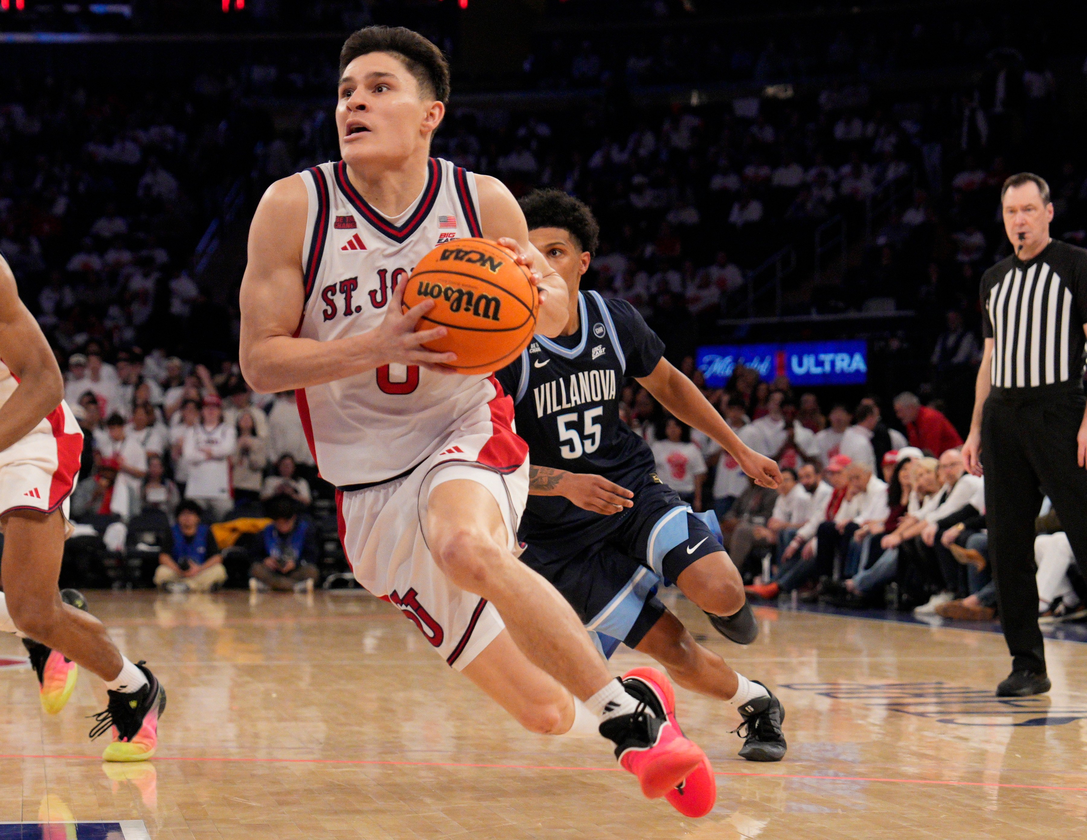 St. John's guard Dylan Darling driving the lane against Villanova