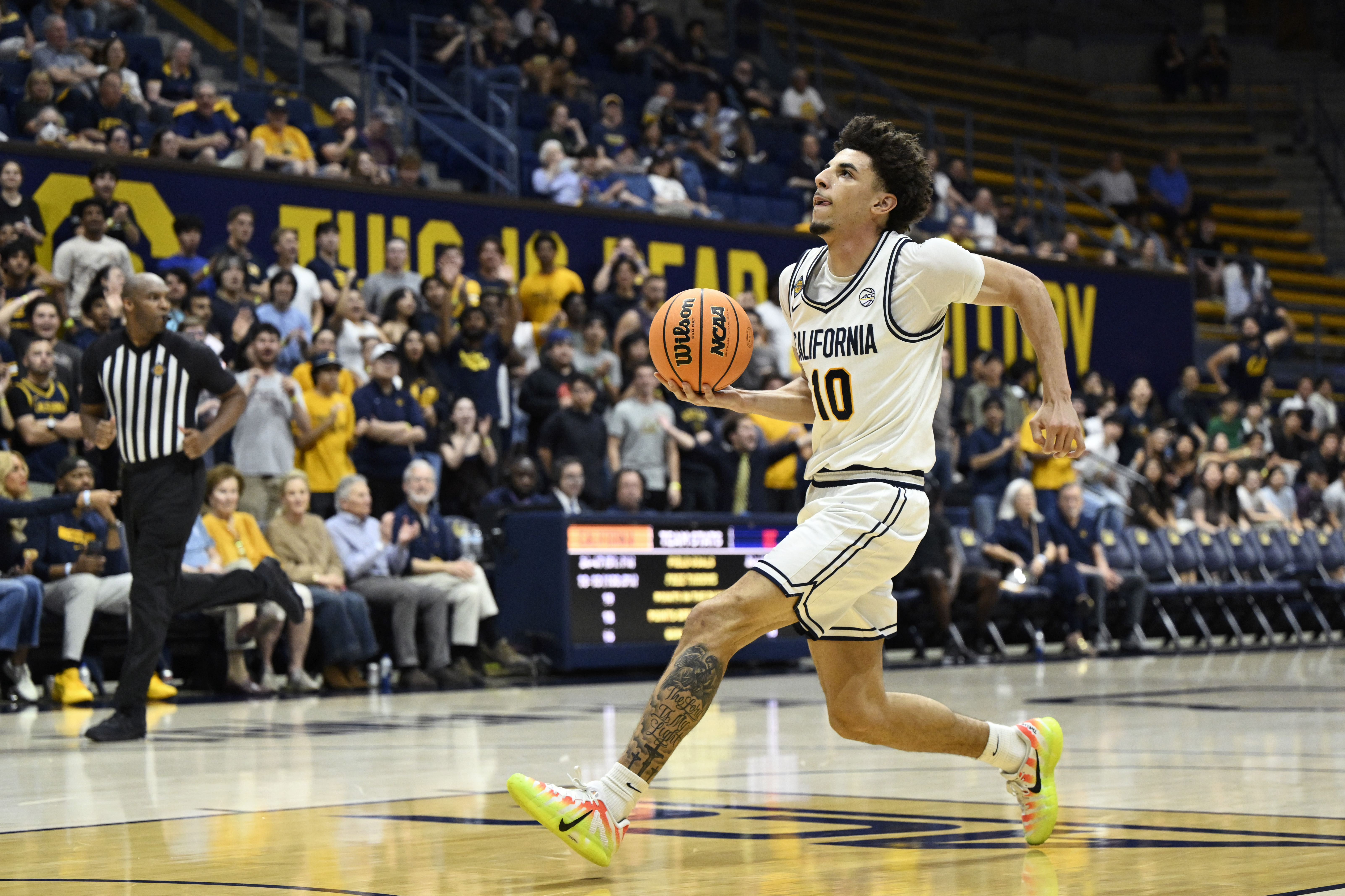 Cal's Justin Pippen takes off for a dunk in a 2026 NIT game against UIC