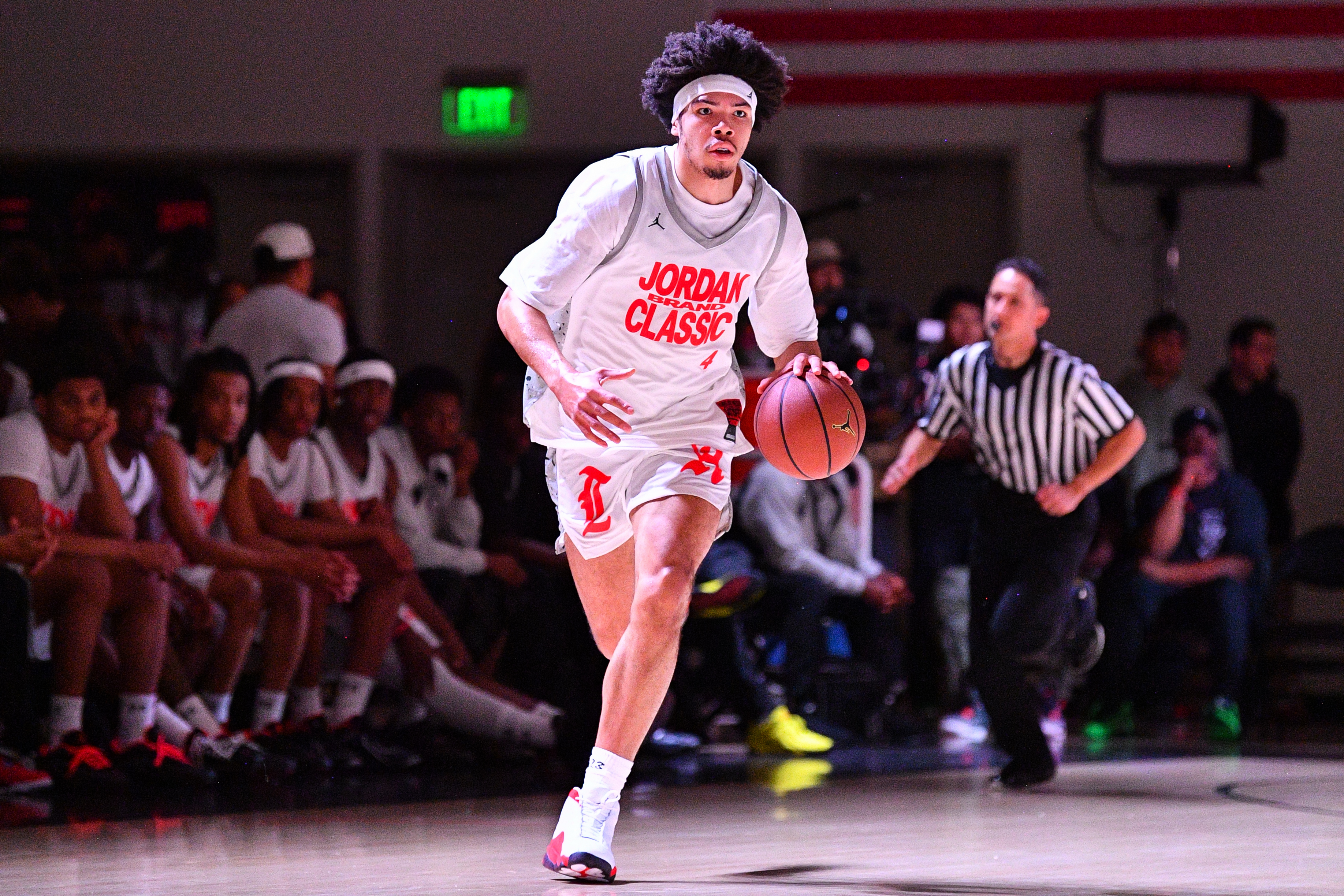 Tyran Stokes dribbles the ball up the court during the Jordan Brand Classic high school All-Star game