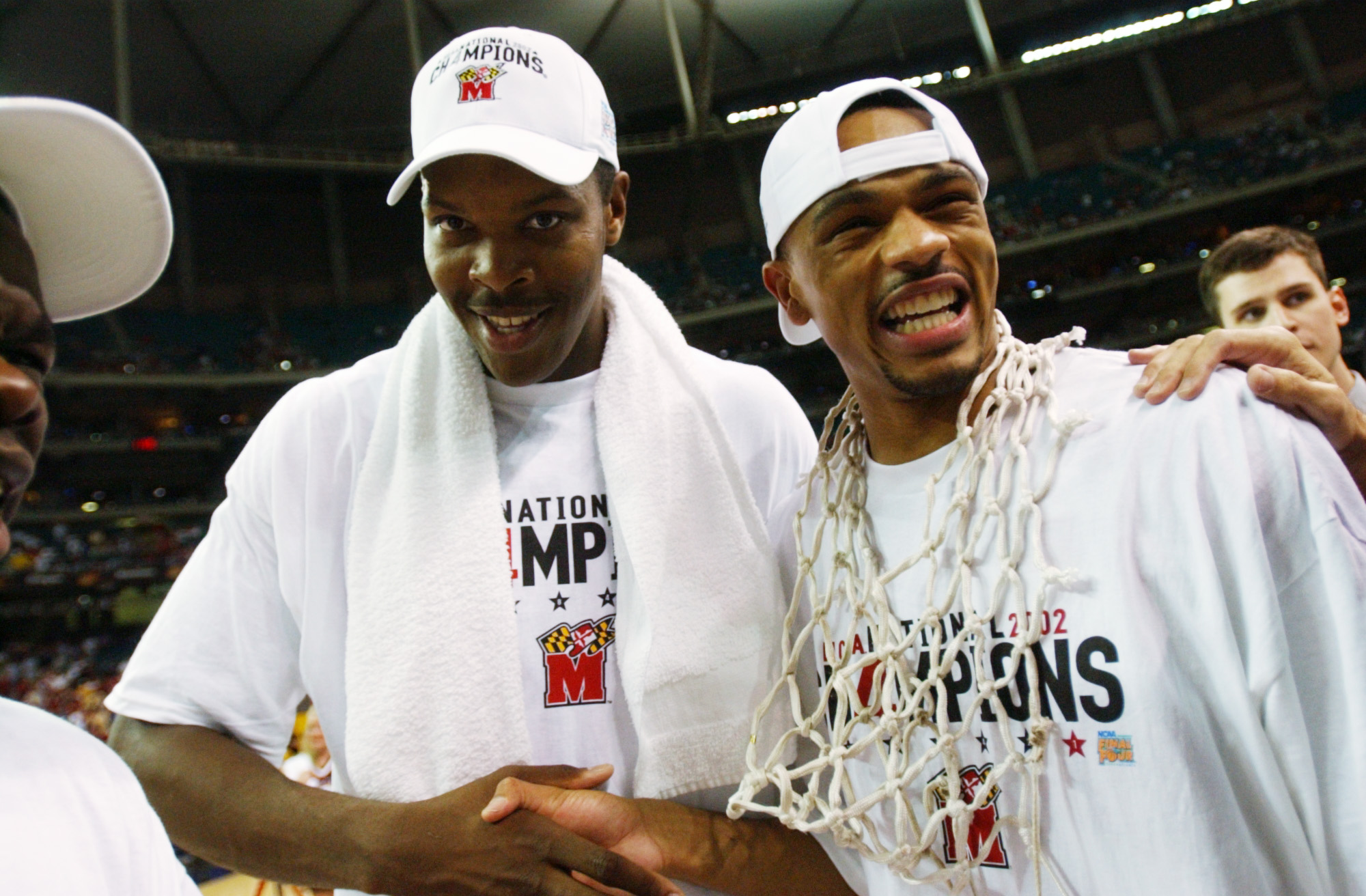 Dixon celebrates with teammate Tahj Holden after winning the 2002 NCAA National Championship game at the Georgia Dome