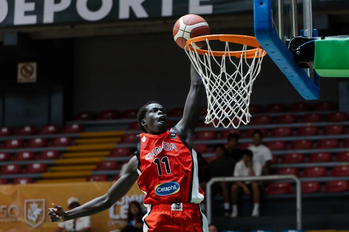 Team Canada's Deng Ngor rising up for a slam dunk