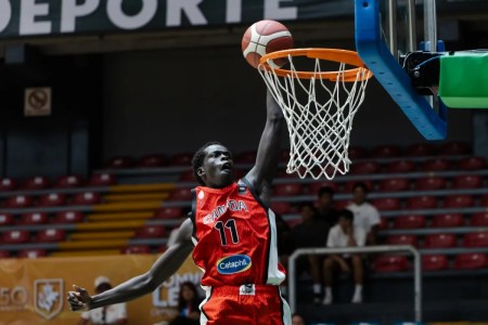 Team Canada's Deng Ngor rising up for a slam dunk