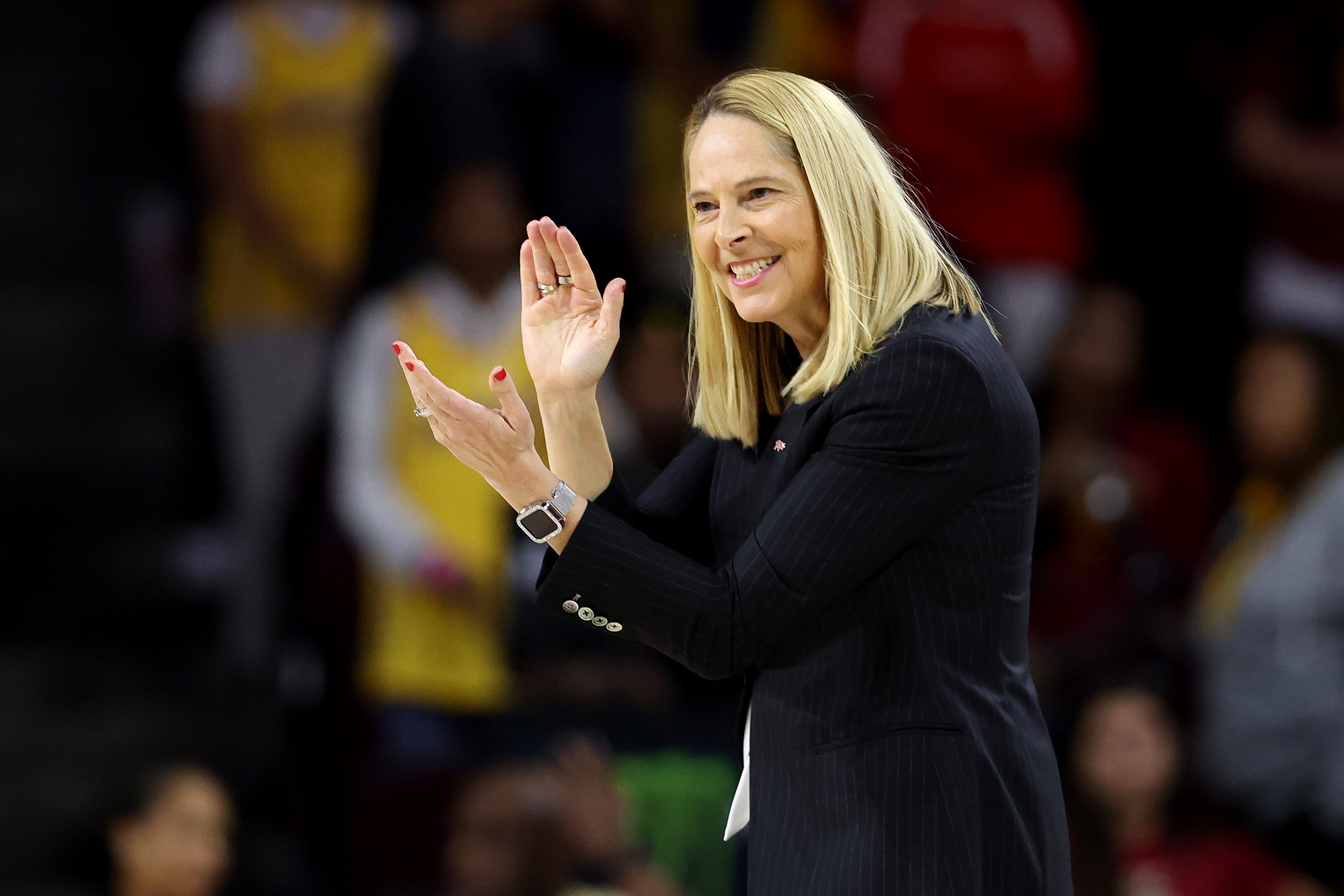 Maryland women's head coach Brenda Frese applauds her team from the sidelines
