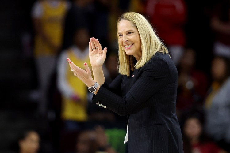 Maryland women's head coach Brenda Frese applauds her team from the sidelines