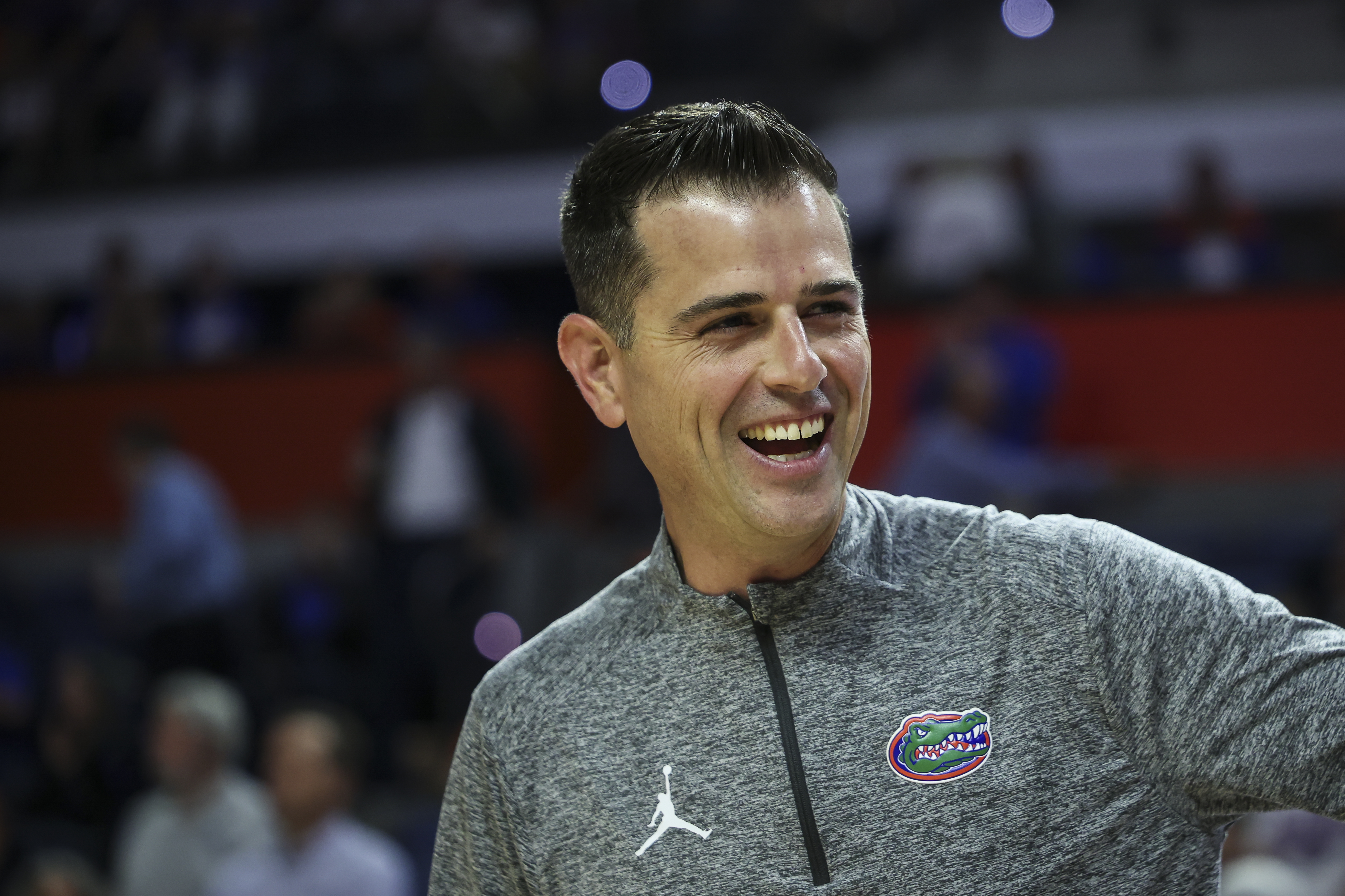Florida head coach Todd Golden is all smiles on the sidelines