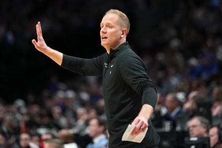 BYU's Kevin Young coaching from the sidelines during a 2026 NCAA Tournament game