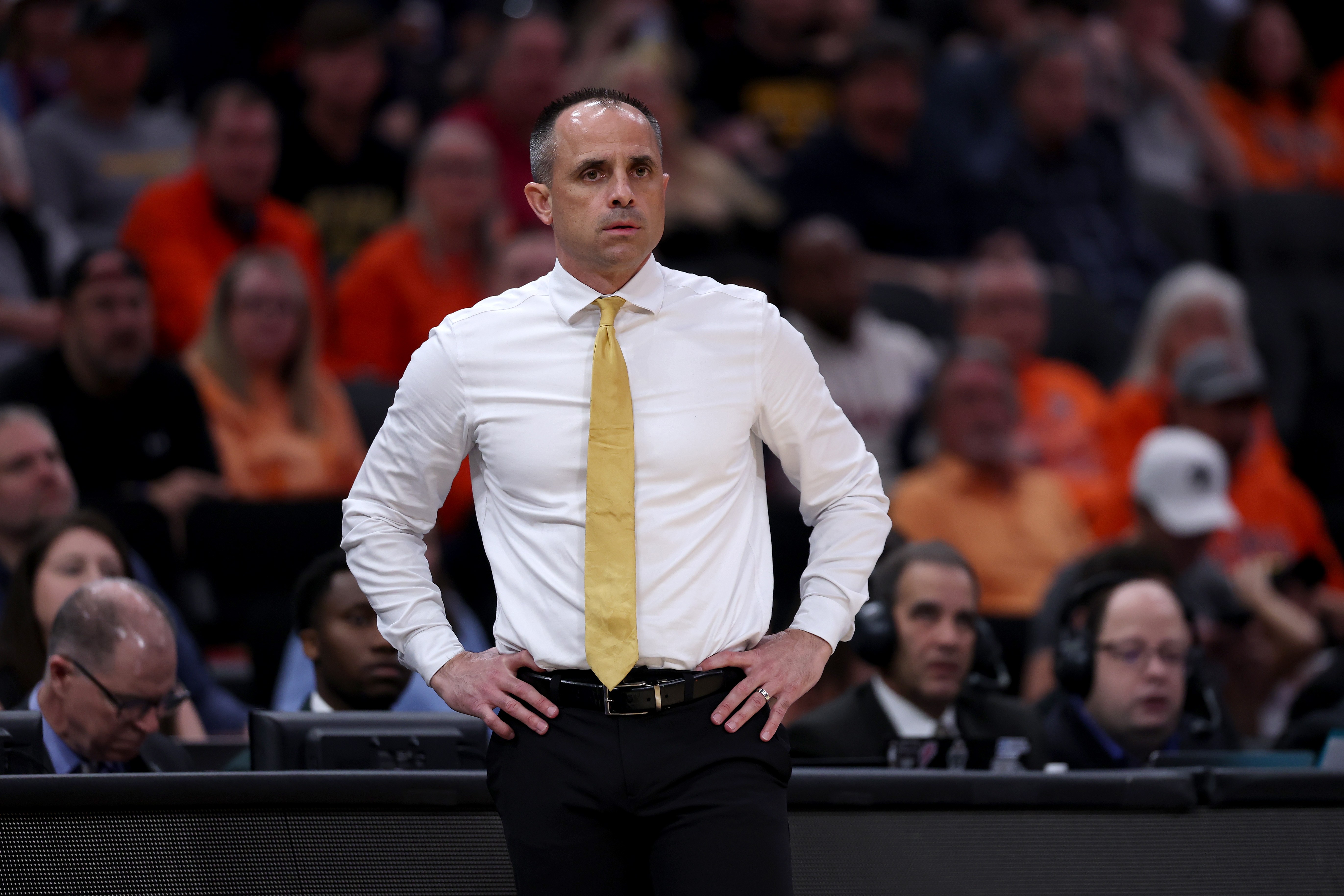 Iowa head coach Ben McCollum looking on from the sidelines during an Elite Eight game against Illinois in 2026