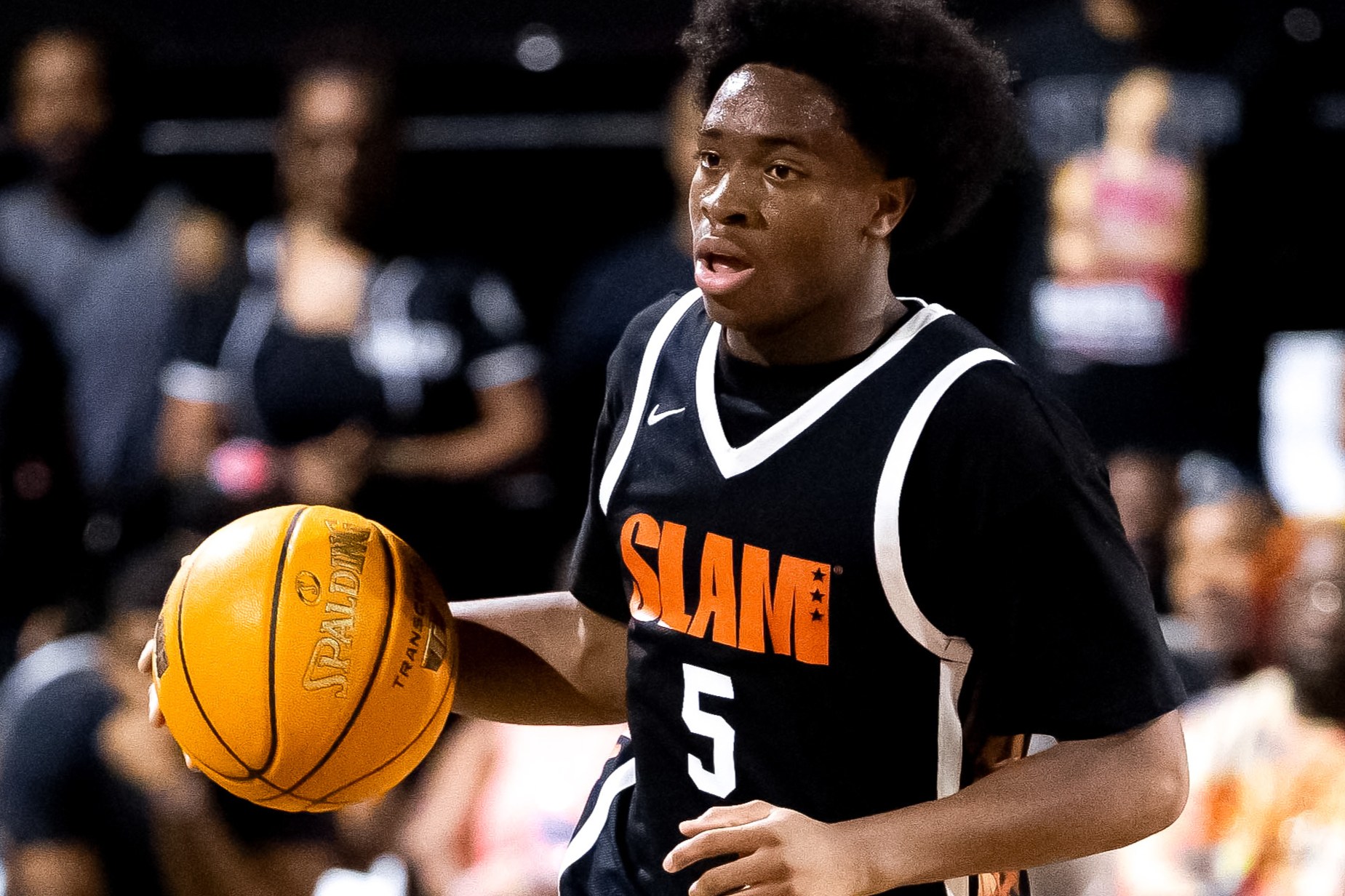 Micah Gordon dribbles the ball during the SLAM Summer Classic at Rucker Park