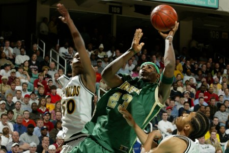LeBron James shoots the ball against R.J. Reynolds High School on January 15, 2003