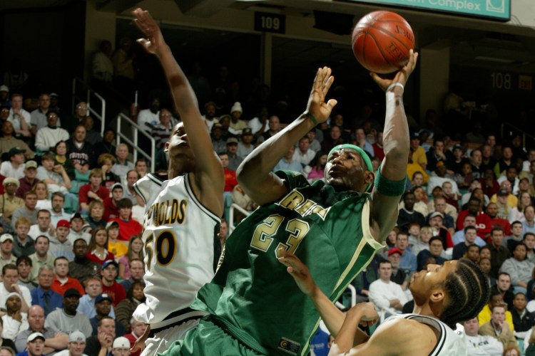 LeBron James shoots the ball against R.J. Reynolds High School on January 15, 2003