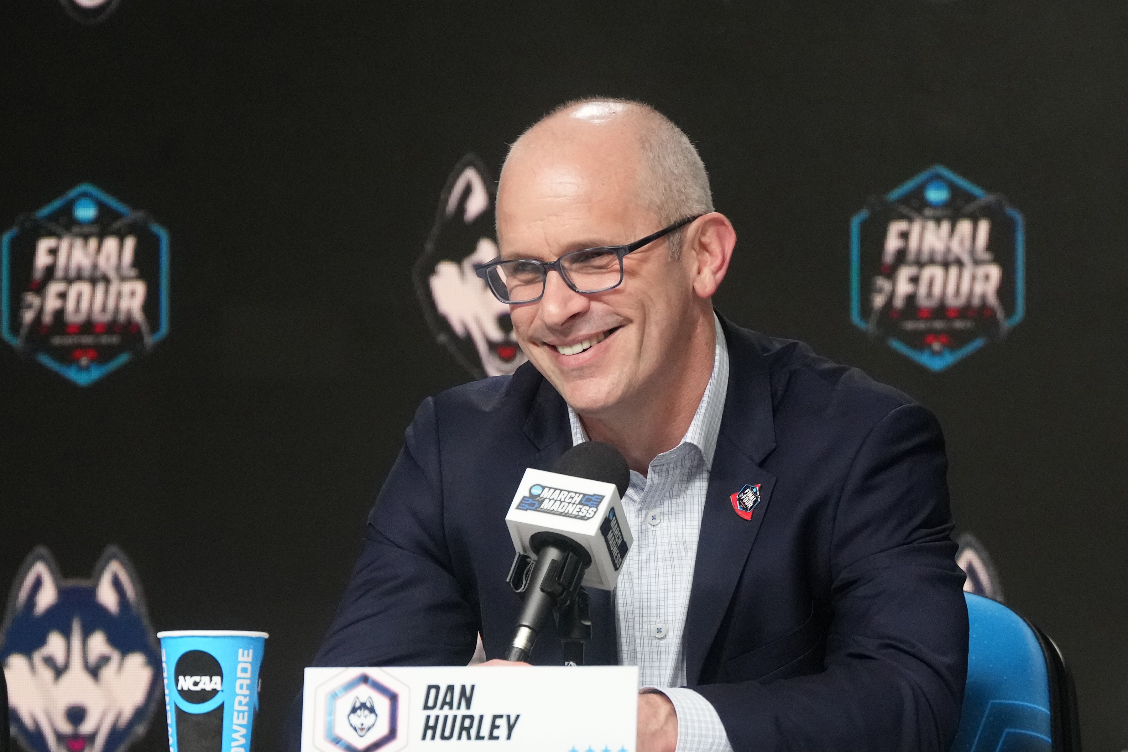Huskies head coach Dan Hurley smiles during a 2026 Final Four press conference