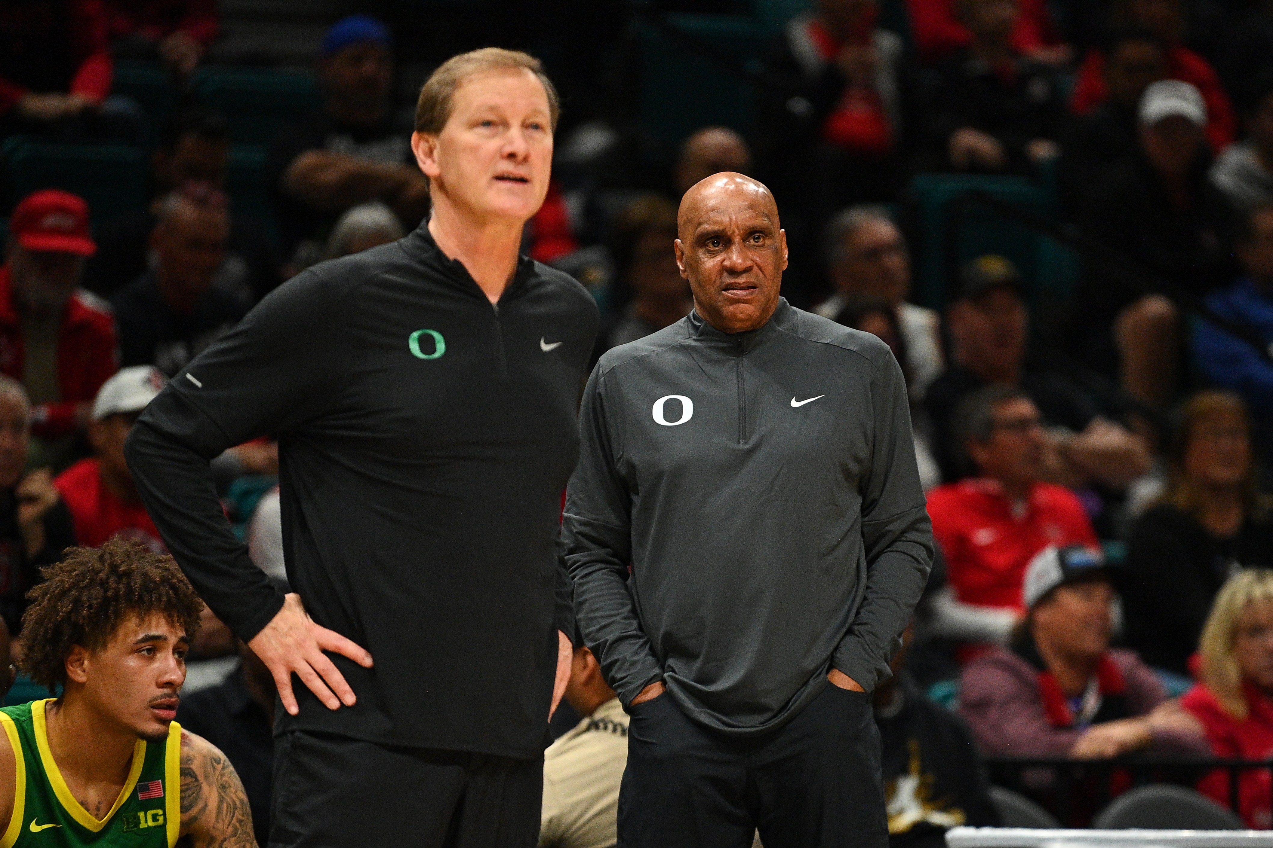 Tony Stubblefield and Dana Altman look on from the Oregon sidelines