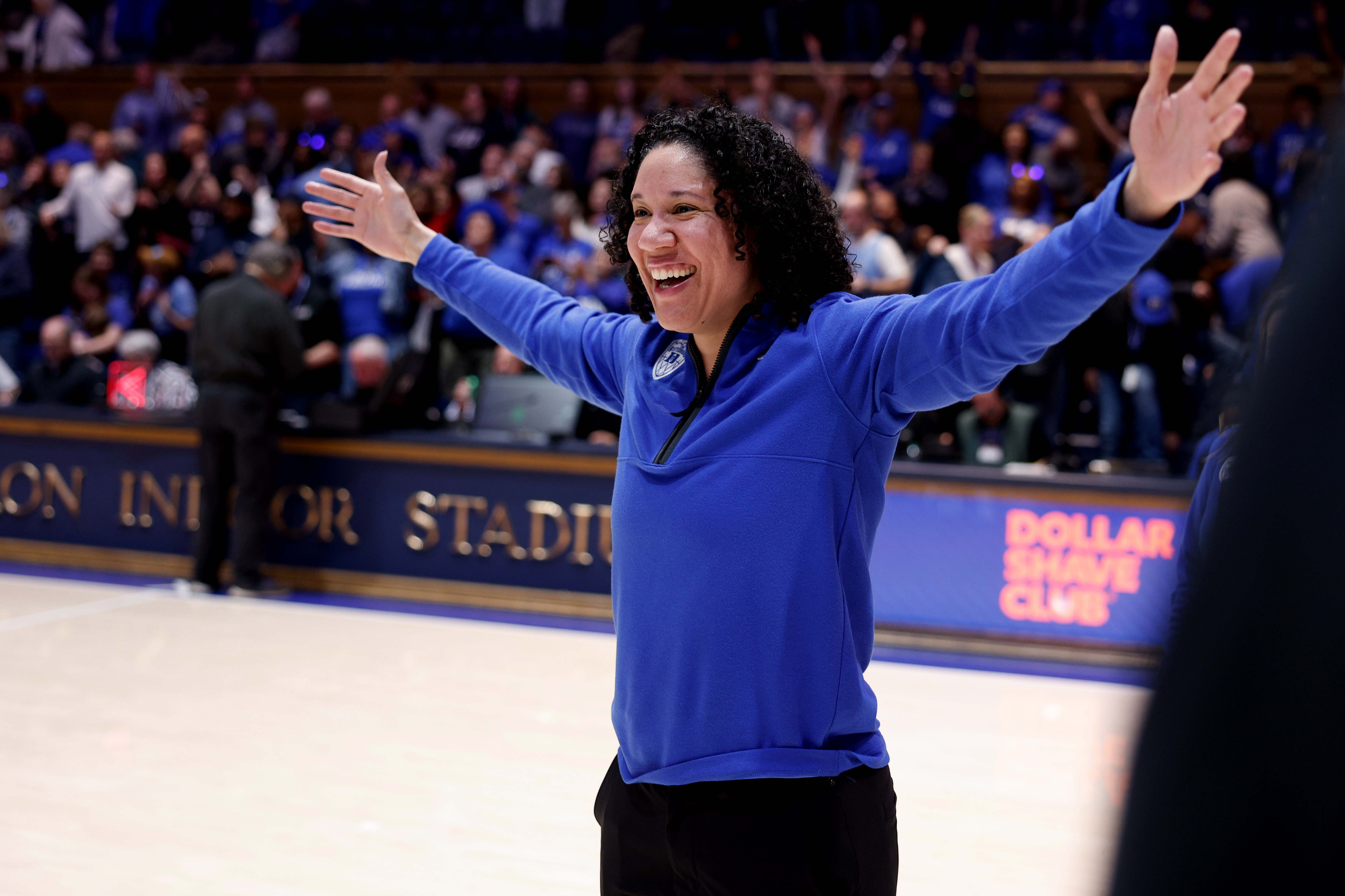 Duke head coach Kara Lawson celebrates a win over North Carolina
