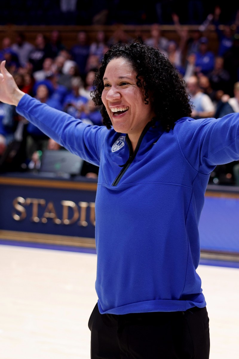Duke head coach Kara Lawson celebrates a win over North Carolina