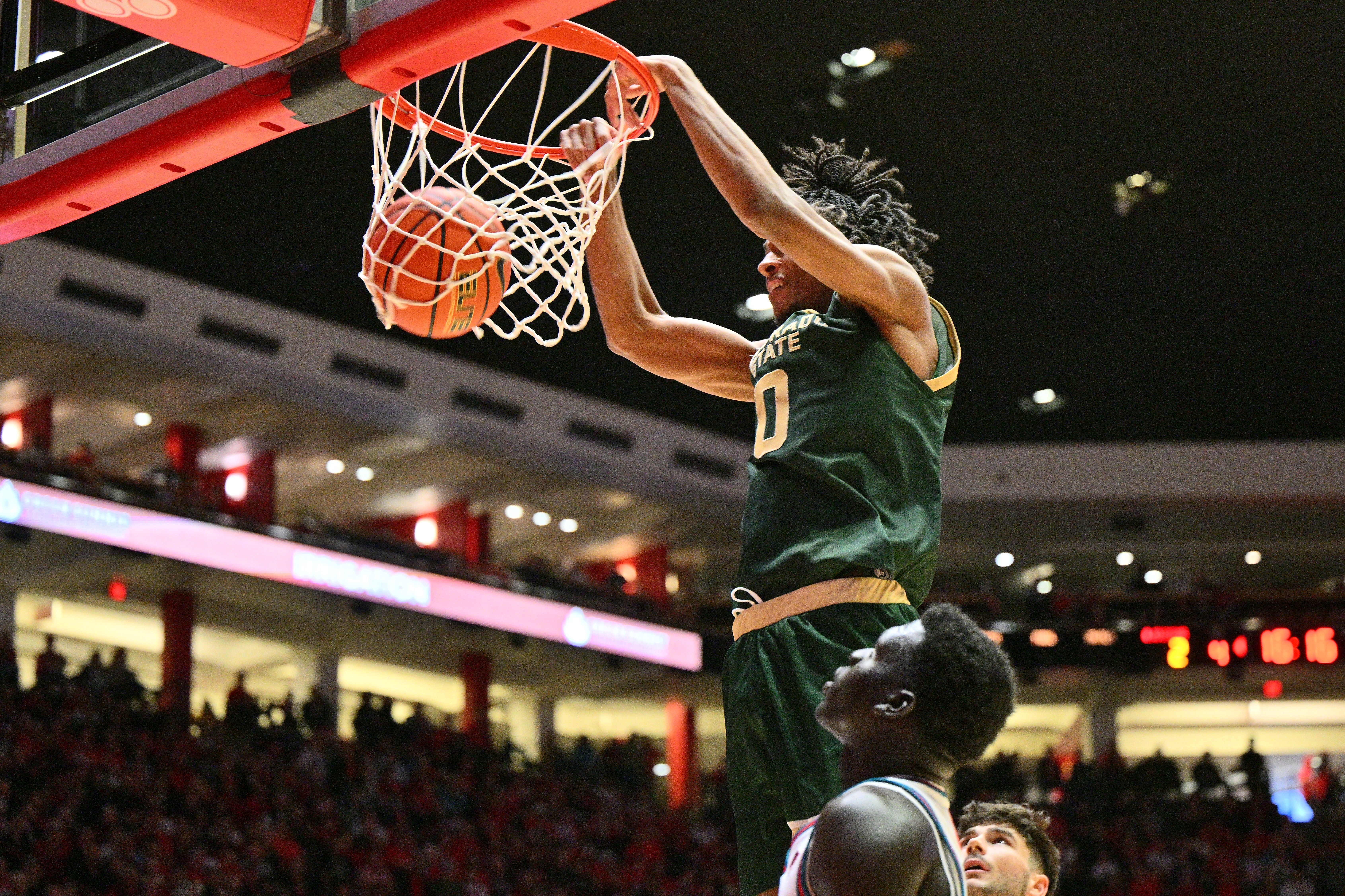 Colorado State forward Carey Booth throwing down a dunk