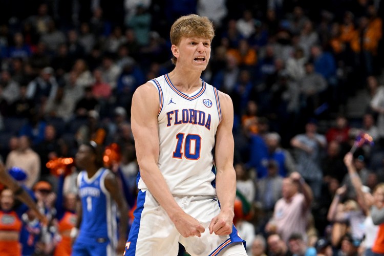 Florida Gators forward Thomas Haugh celebrates a basket