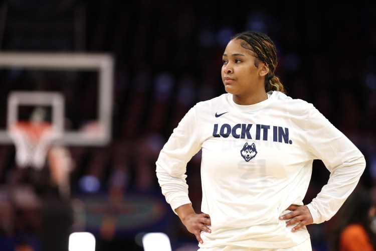 UConn's Sarah Strong looks on during pregame warm-ups