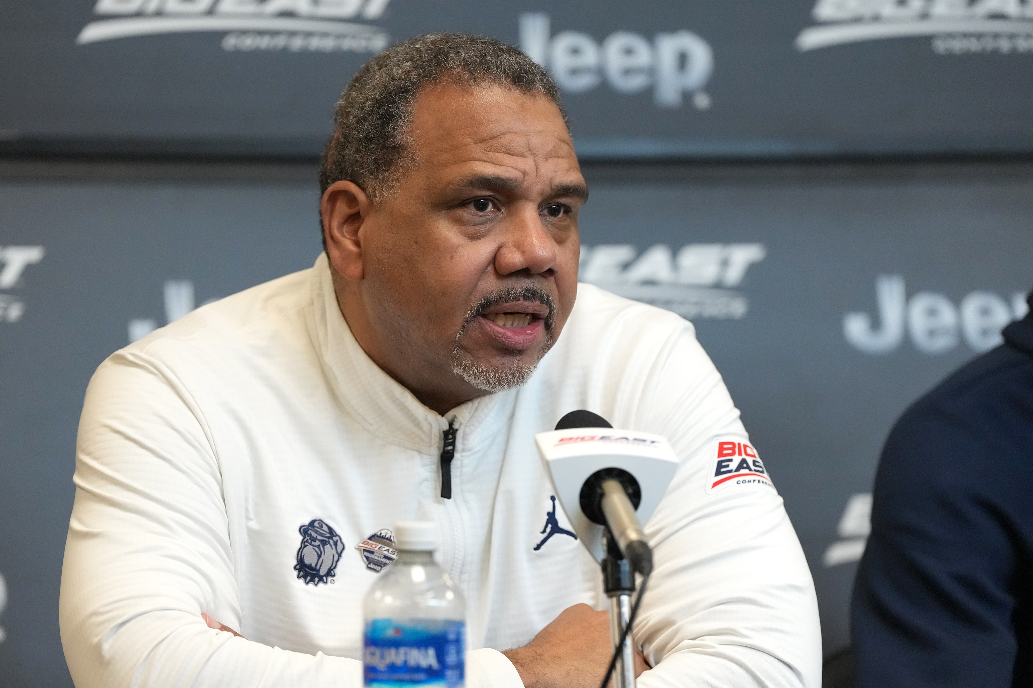 Georgetown head coach Ed Cooley speaking to the media