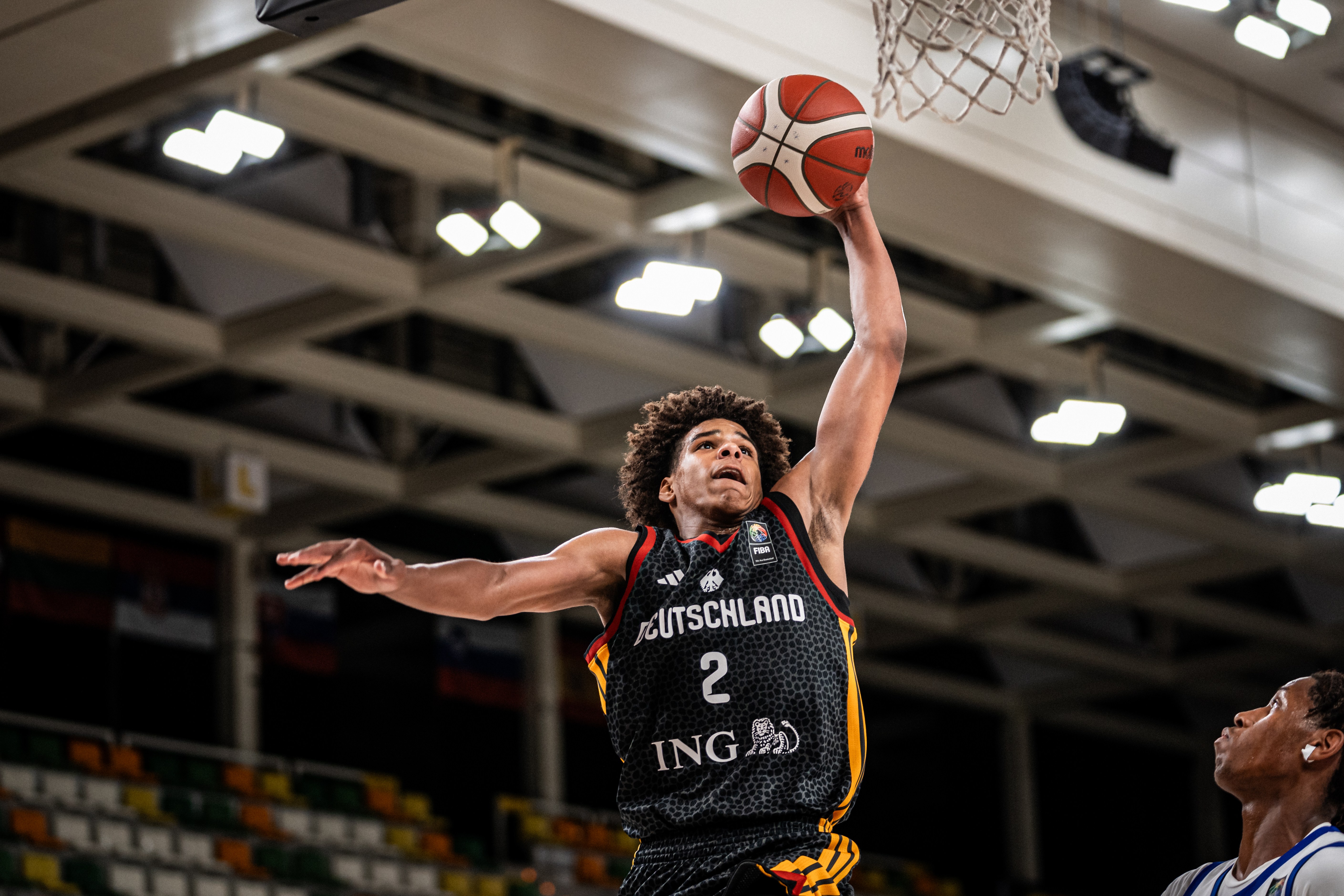 German guard Lucai Anderson goes up for a dunk at the 2026 FIBA U18 EuroBasket tournament