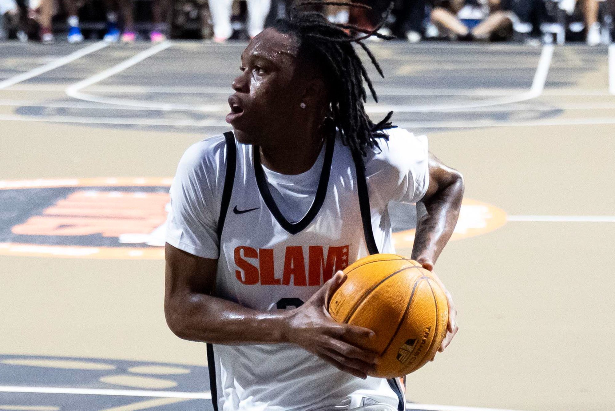 King Gibson drives the lane during the SLAM Summer Classic at Rucker Park
